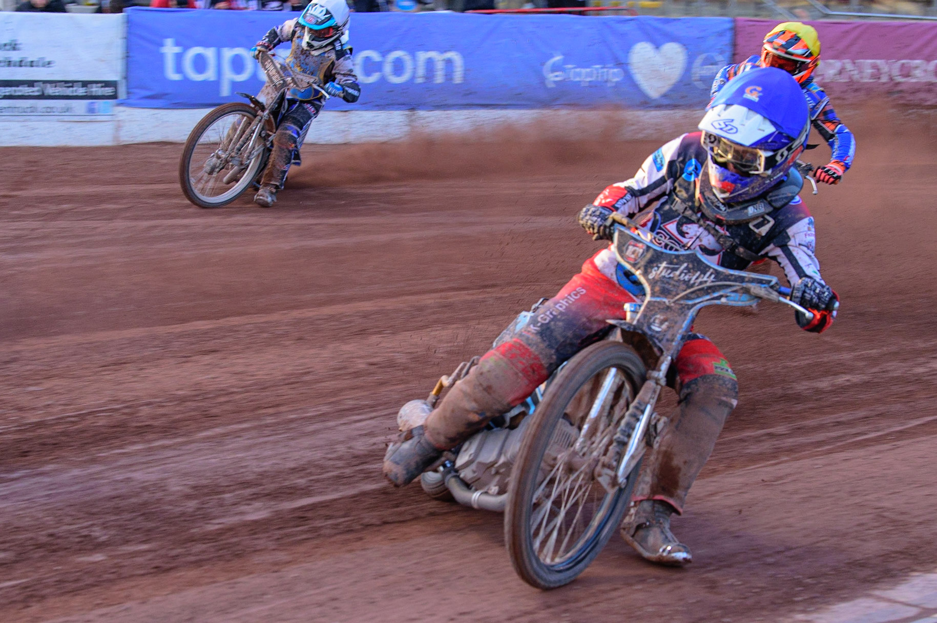 MANCHESTER, UK. MAY 27TH Freddy Hodder (Blue)  leads Lewis Millar  (Yellow) and Kyran Lydan (White) during the National Development League match between Belle Vue Colts and Armadale Devils at the National Speedway Stadium, Manchester on Friday 27th May 2022. (Credit: Ian Charles | MI News)