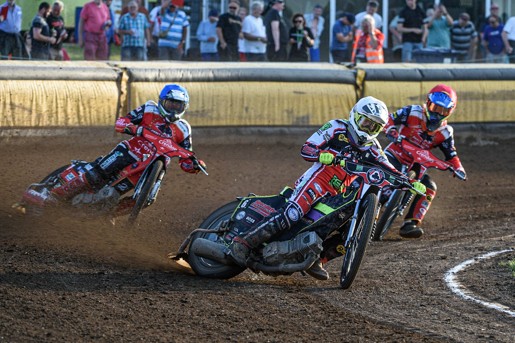 PETERBOROUGH, UK. JULY 19TH  Tom Brennan  (White) leads Chris Harris  (Blue) and Jordan Palin  (Red) during the SGB Premiership match between Peterborough and Belle Vue Aces at East of England Showground, Peterborough on Monday 19th July 2021. (Credit: Ian Charles | MI News)