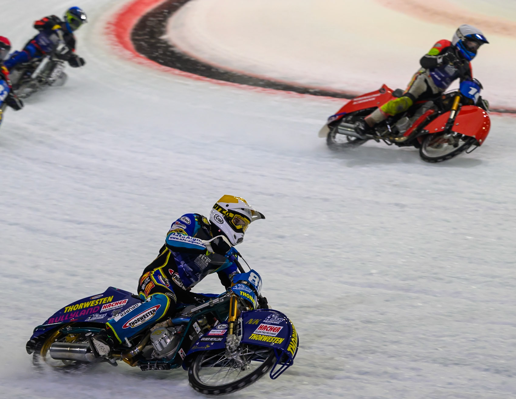 Luca Bauer (85) of Italy/Germany  in Yellow rides outside Wild Card Harald Simon (16) of Austria in White during the FIM Ice Speedway Gladiators World Championship Final 3 at Ice Rink Thialf, Heerenveen on Saturday 11th April 2026. (Photo: Ian Charles | MI News)