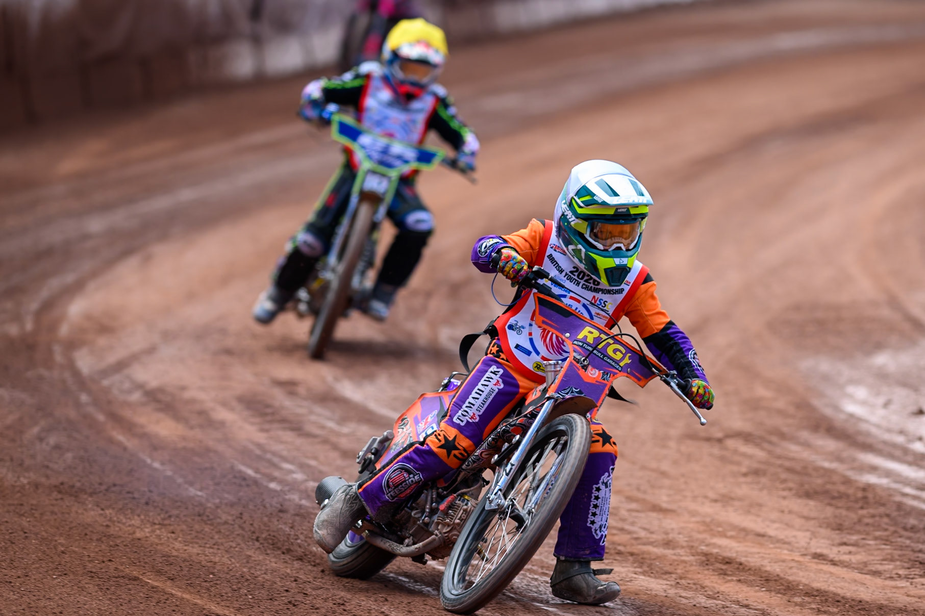 125cc SUPPORT CLASS Seb Kelly (57) in White leading Cody Smith (162) in Yellow during the British Youth Championship (125cc) at the National Speedway Stadium, Manchester on Sunday 19th July 2026. (Photo: Ian Charles | MI News)