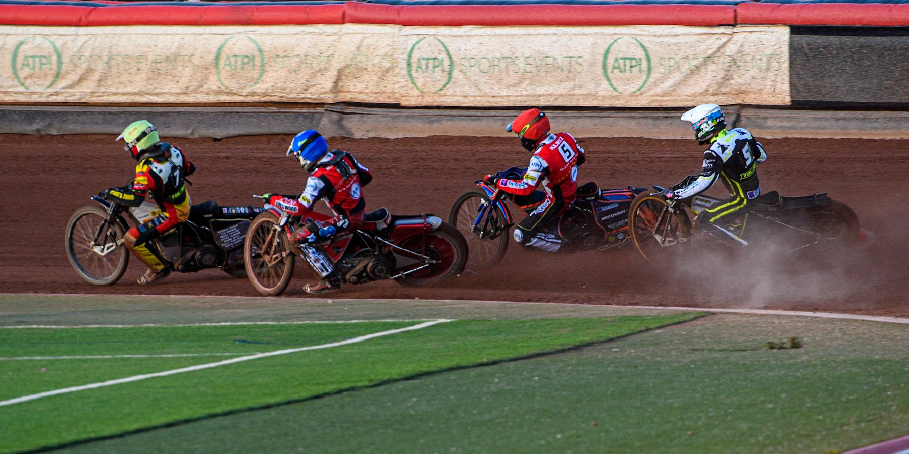 Dan Thompson (Yellow) leads Connor Bailey (Blue), Brady Kurtz (Red) and Jason Doyle (White) during the Sports Insure Premiership match between Belle Vue Aces and Ipswich Witches at the National Speedway Stadium, Manchester on Monday 17th July 2023. (Photo: Ian Charles | MI News)