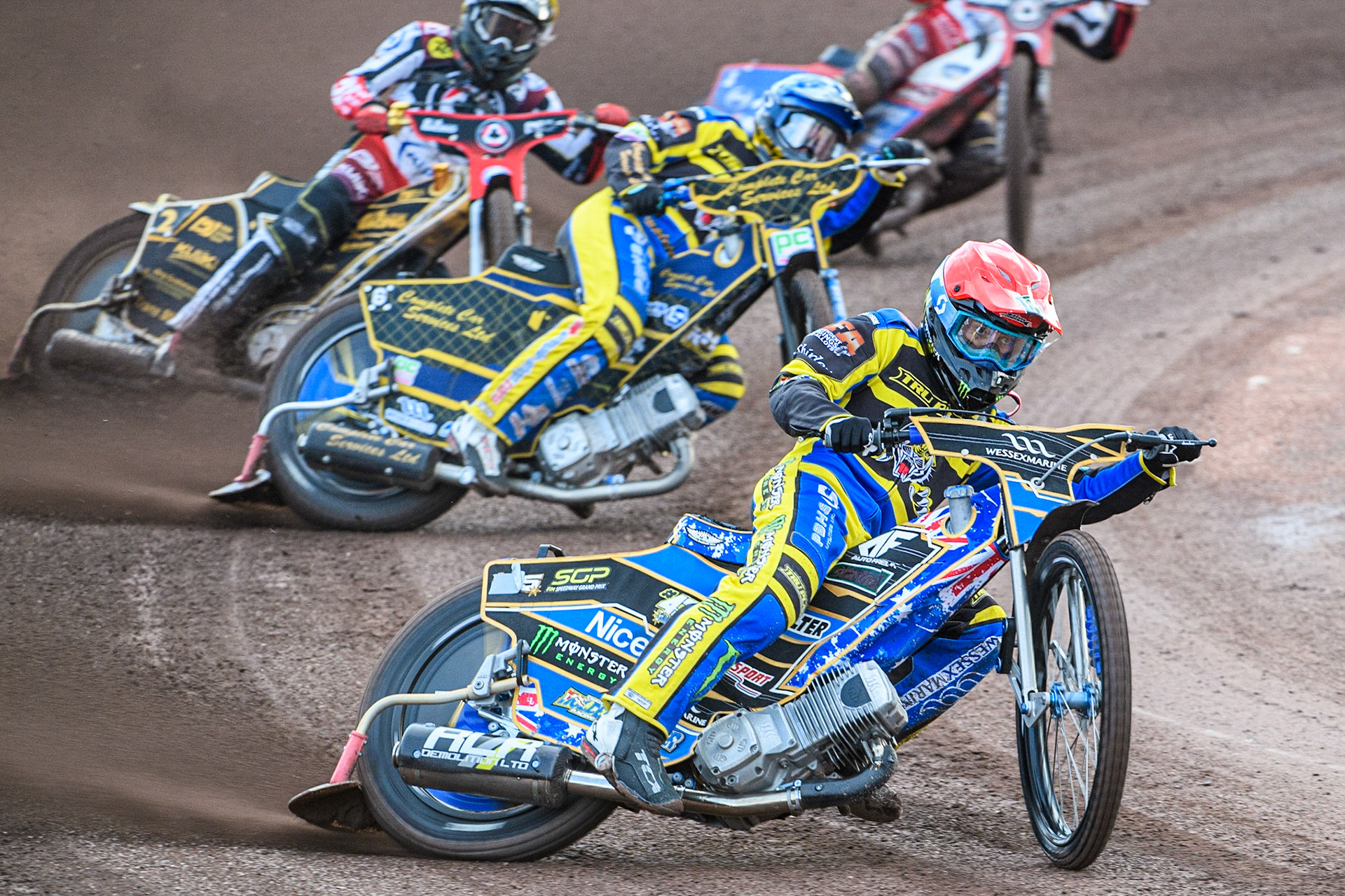 Jack Holder (Red) and Kyle Howarth (Blue) lead Norick Blodorn (Yellow) during the Sports Insure Premiership match between Sheffield Tigers and Belle Vue Aces at Owlerton Stadium, Sheffield on Thursday 20th July 2023. (Photo: Ian Charles | MI News)