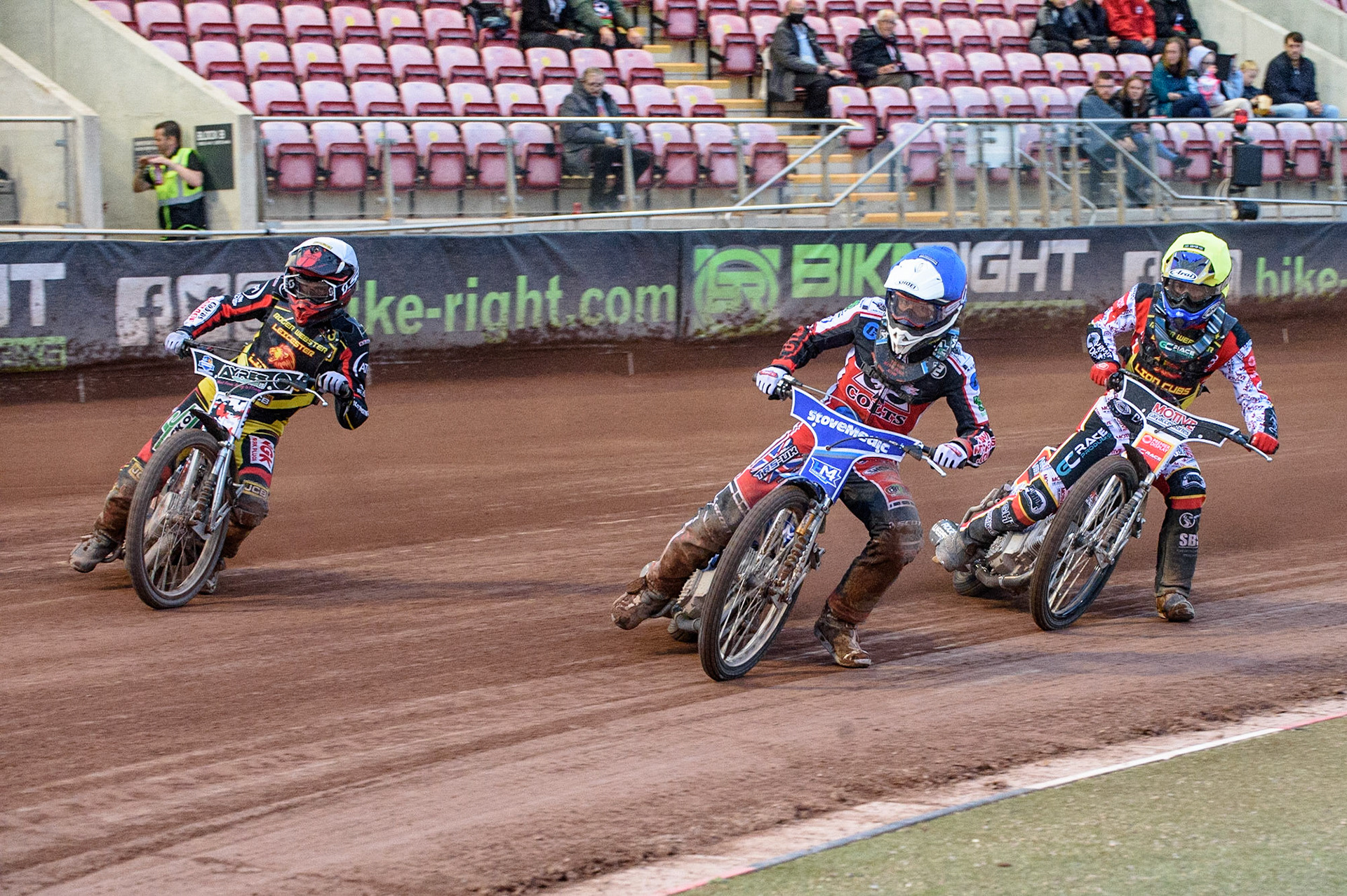 MANCHESTER, UK. JULY 29TH  Harry McGurk  (Blue) ahead of Joe Lawlor  (White) and Tom Spencer   (Yellow)  during the National Development League match between Belle Vue Colts and Leicester Lion Cubs at the National Speedway Stadium, Manchester on Thursday 29th July 2021. (Credit: Ian Charles | MI News)