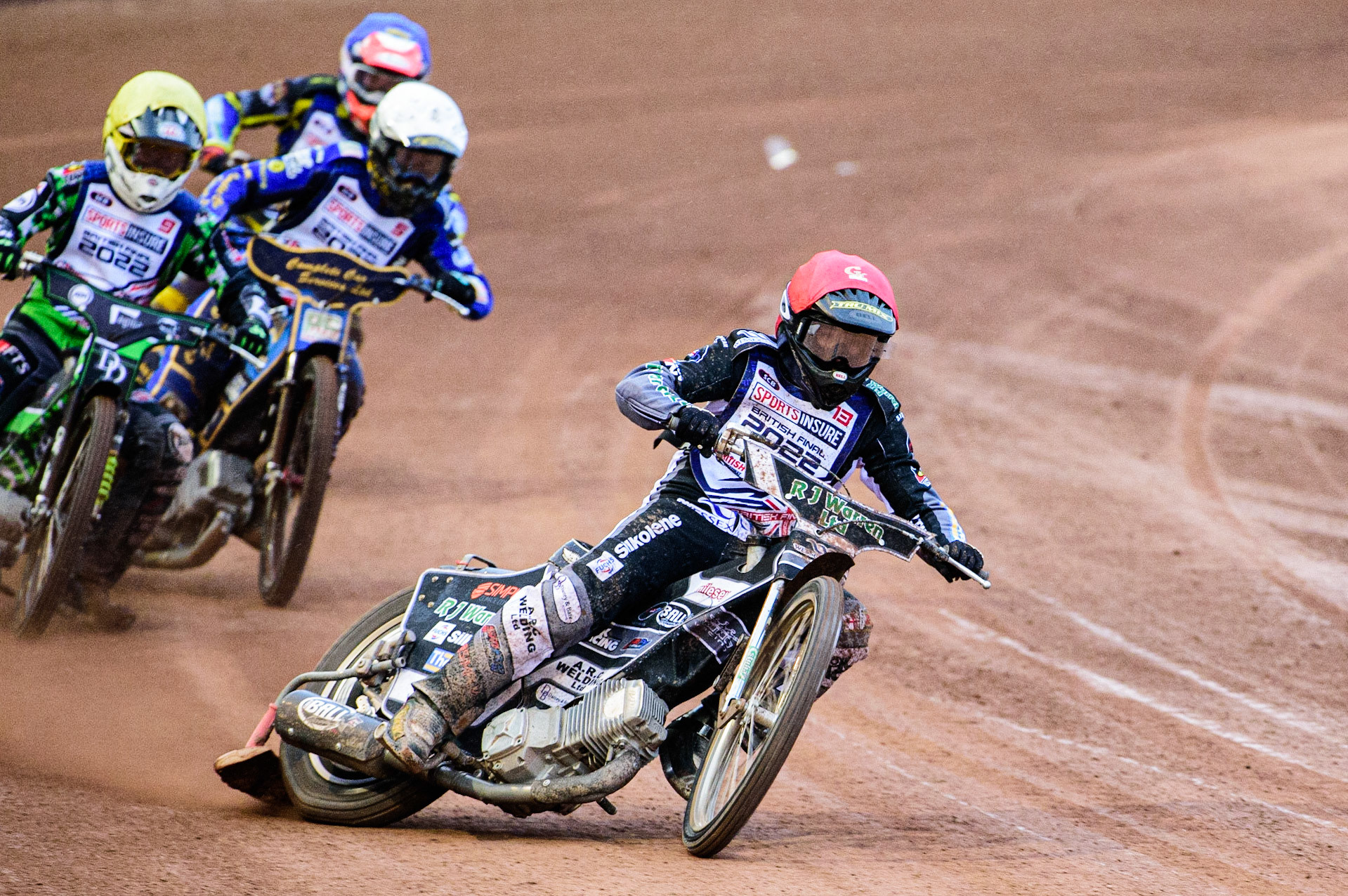 Danny King  (Red) \leads Charles Wright  (Yellow) Kyle Howarth  (White) and Connor Mountain (Blue) during the Sports Insure British Speedway Championship Final at the National Speedway Stadium, Bellevue, Manchester, England on Monday 1st August 2022. (Photo by: Ian Charles | MI News)