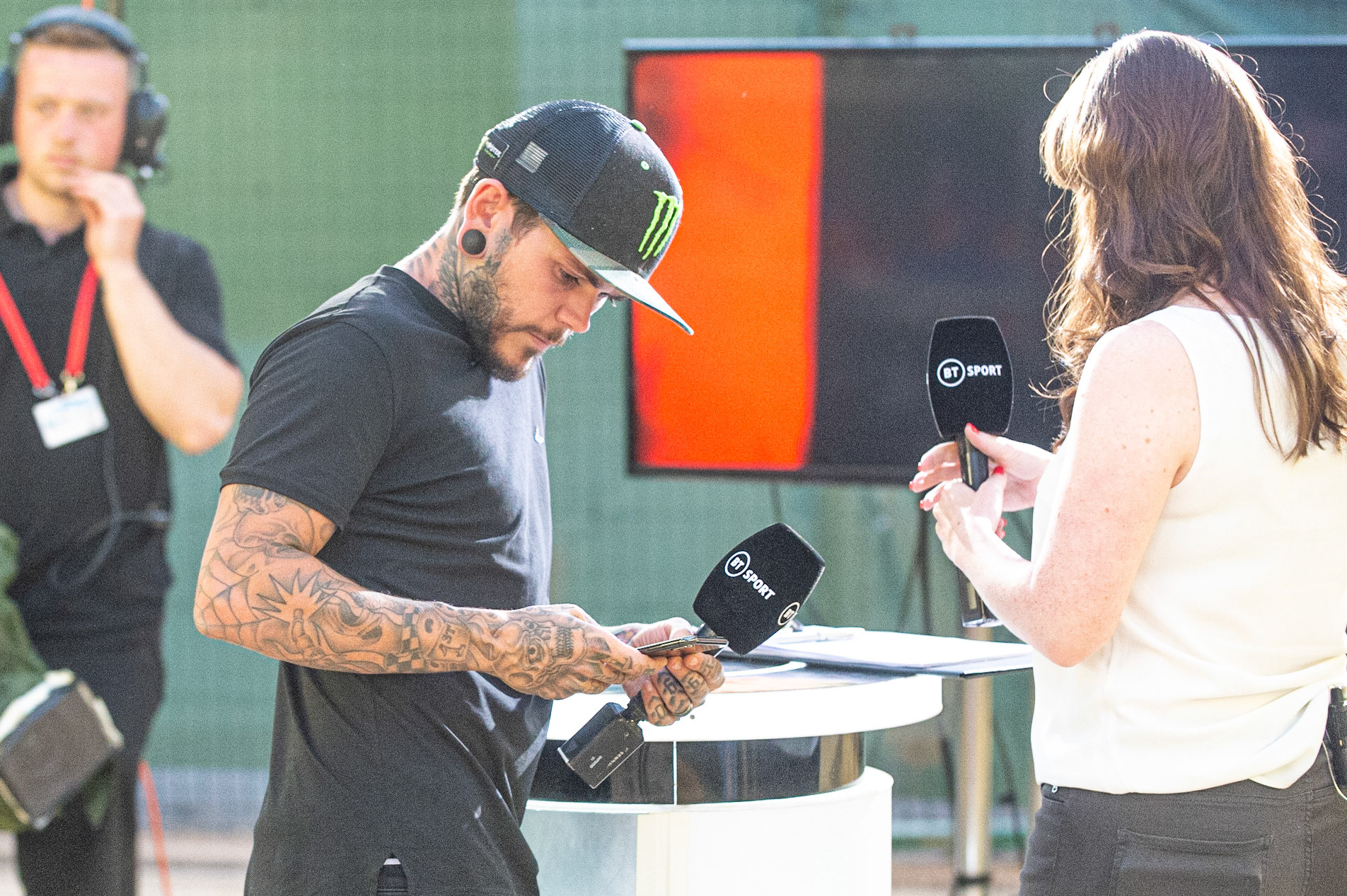 Photo: Ian Charles

World Champion Tai Woffinden checks his phone before the next link for BT Sport

Sports Insure British Final,  Belle Vue National Speedway Stadium, Manchester Monday 29  July  2019