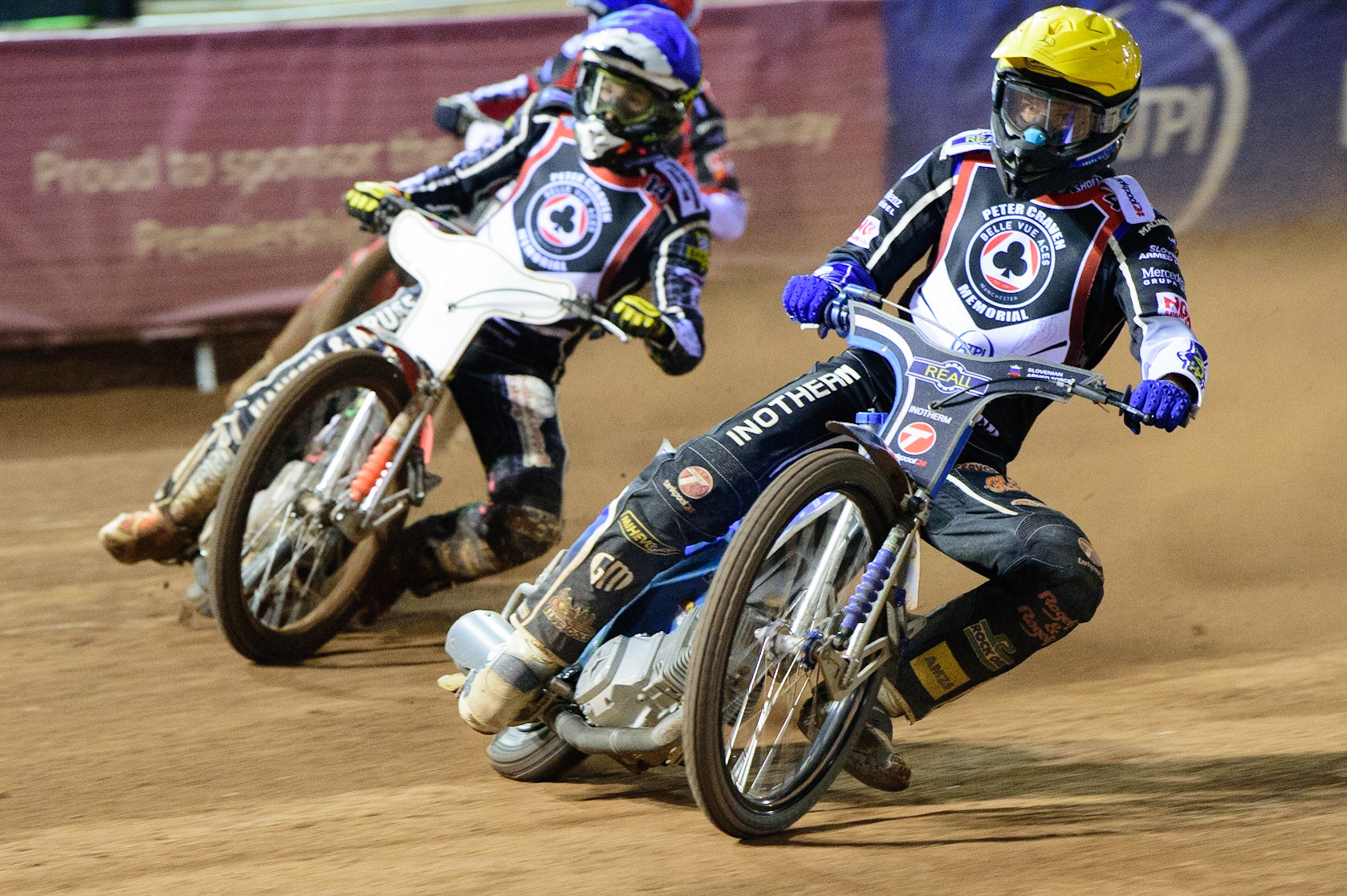 MANCHESTER, UK. MAR 21ST. Matej Žagar  (Yellow) inside Niels-Kristian Iversen (Blue)  during the ATPI Peter Craven Memorial Trophy at the National Speedway Stadium, Manchester on Monday 21st March 2022. (Credit: Ian Charles | MI News)