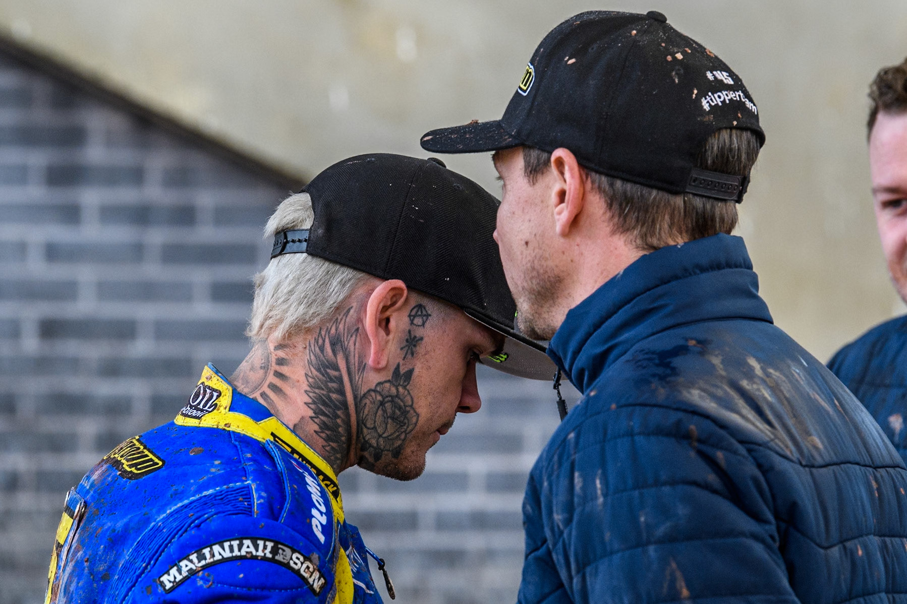 Sheffield Tigers' Team Manager Simon Stead (Right) chats with Sheffield Tigers' Tai Woffinden during the Rowe Motor Oil Premiership match between Belle Vue Aces and Sheffield Tigers at the National Speedway Stadium, Manchester on Monday 27th May 2024. (Photo: Ian Charles | MI News)