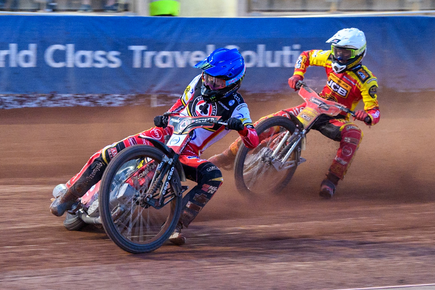 Belle Vue Aces' Dan Bewley in Blue leading Leicester Lions' Max Fricke in White during the Rowe Motor Oil Premiership match between Belle Vue Aces and Leicester Lions at the National Speedway Stadium, Manchester on Monday 19th May 2025. (Photo: Ian Charles | MI News)
