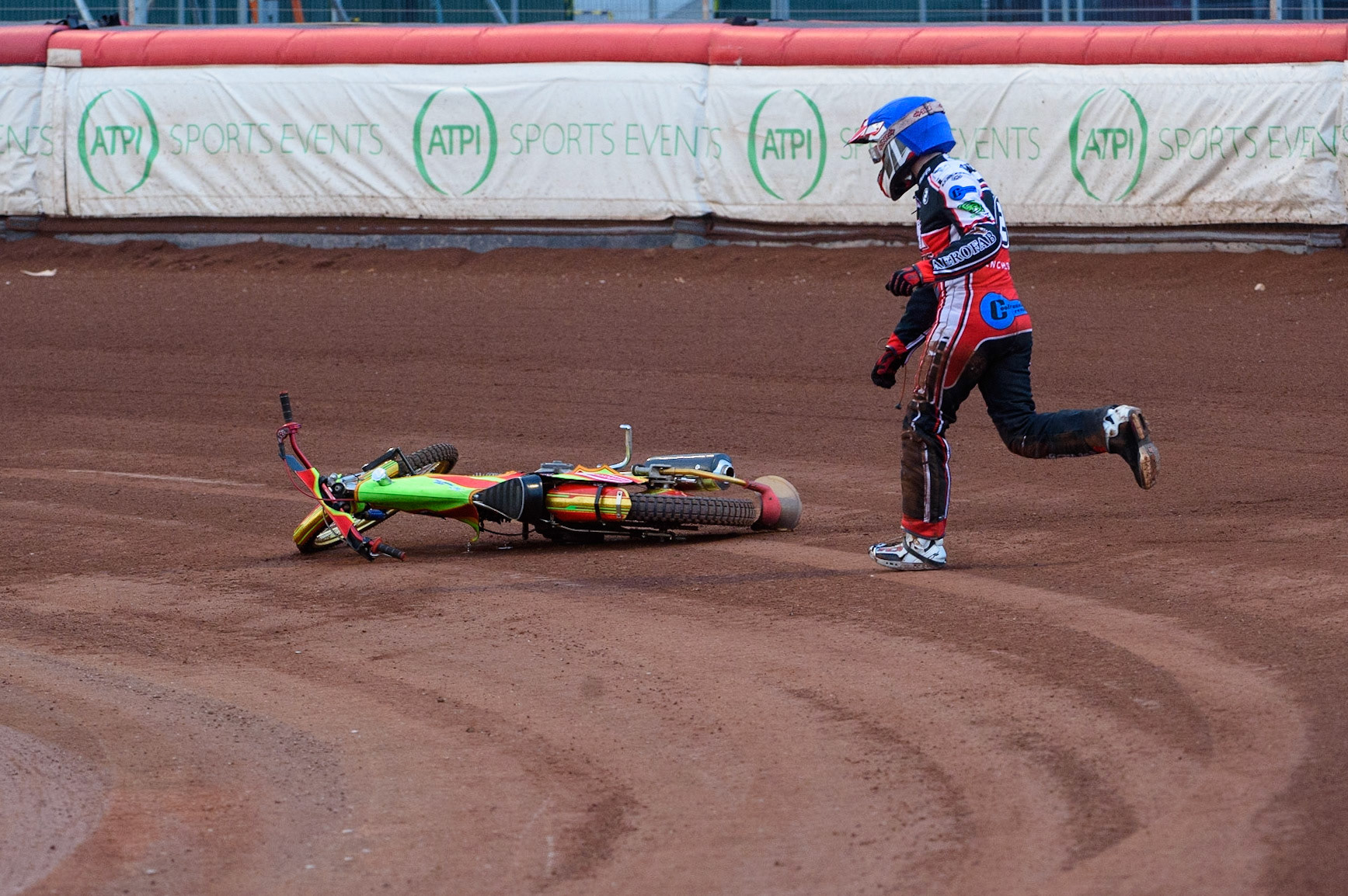 MANCHESTER, UK. MAY 28TH  After parting company with his machine, Ben Woodhull runs to move his bike to avoid a race stoppage during the SGB National Development League match between Belle Vue Colts and Berwick Bullets at the National Speedway Stadium, Manchester on Friday 28th May 2021. (Credit: Ian Charles | MI News)