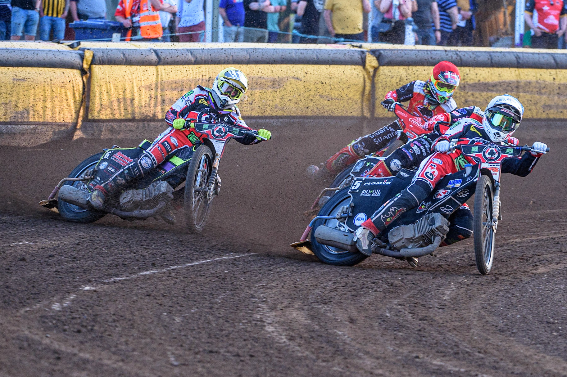 PETERBOROUGH, UK. JULY 19TH  Dan Bewley  (White) and Tom Brennan  (Yellow) lead Scott Nicholls   (Blue) and Michael Palm-Toft (Red) during the SGB Premiership match between Peterborough and Belle Vue Aces at East of England Showground, Peterborough on Monday 19th July 2021. (Credit: Ian Charles | MI News)