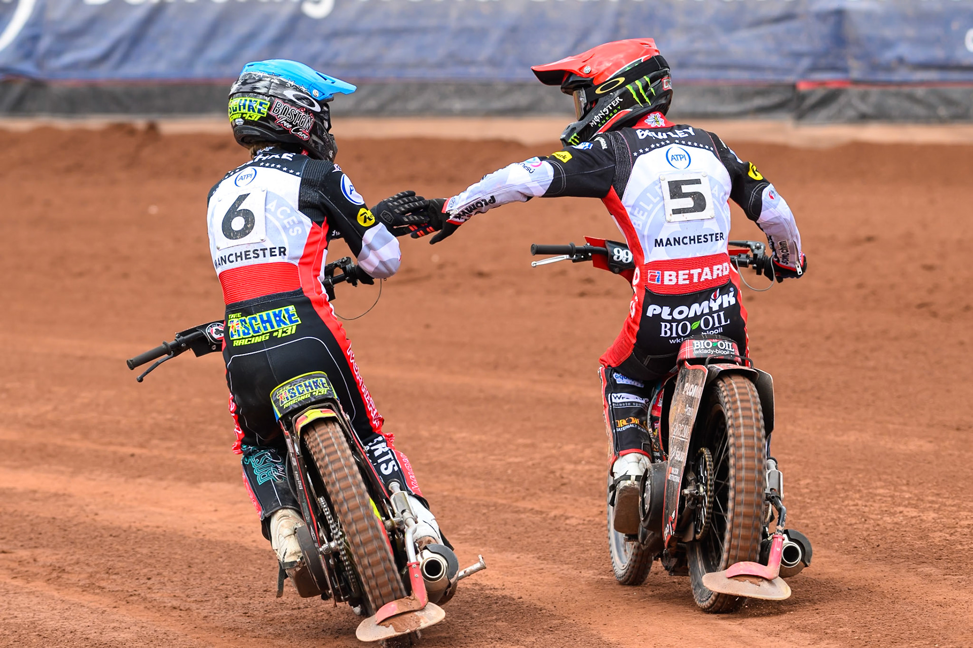 Tate Zischke of Belle Vue Aces  in Blue and Dan Bewley of Belle Vue Aces in Red celebrate their maximum points heat win during the Rowe Motor Oil Premiership match between Belle Vue Aces and Northampton Foxes at the National Speedway Stadium, Manchester on Monday 4th May 2026. (Photo: Ian Charles | MI News)