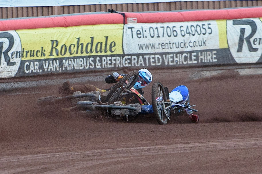 MANCHESTER, UK. JULY 29TH   Harry McGurk (Blue) picks up some drive and falls during the National Development League match between Belle Vue Colts and Leicester Lion Cubs at the National Speedway Stadium, Manchester on Thursday 29th July 2021. (Credit: Ian Charles | MI News)
