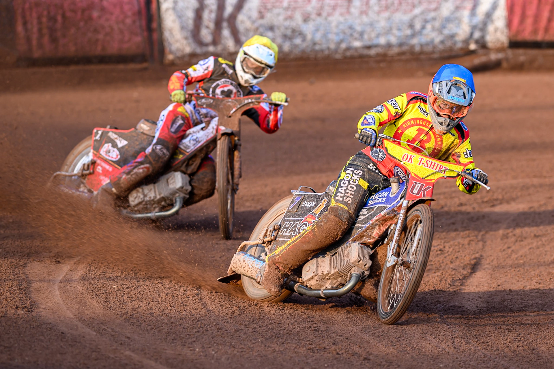 Birmingham Brummies' Jason Edwards in Blue leading Belle Vue Aces' Jake Mulford in Yellow during the Rowe Motor Oil Premiership match between Birmingham Brummies and Belle Vue Aces at Perry Bar Stadium, Birmingham on Monday 2nd June 2025. (Photo: Ian Charles | MI News)