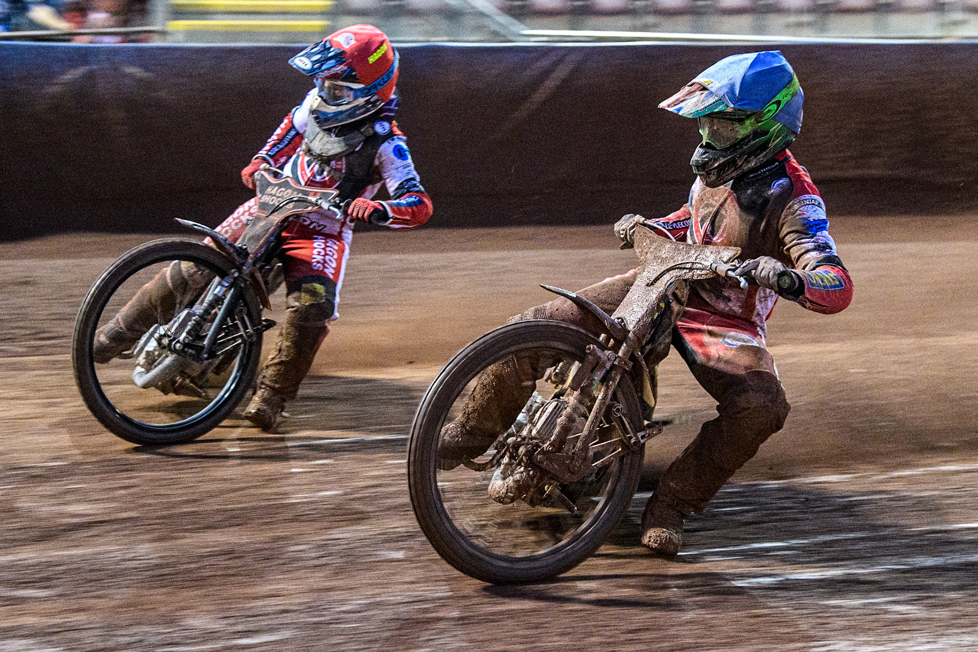 Belle Vue Colts' William Cairns  in Blue rides inside Belle Vue Colts' Sam Hagon  in Red during the WSRA National Development League match between Belle Vue Colts and Oxford Chargers at the National Speedway Stadium, Manchester on Friday 2nd August 2024. (Photo: Ian Charles | MI News)