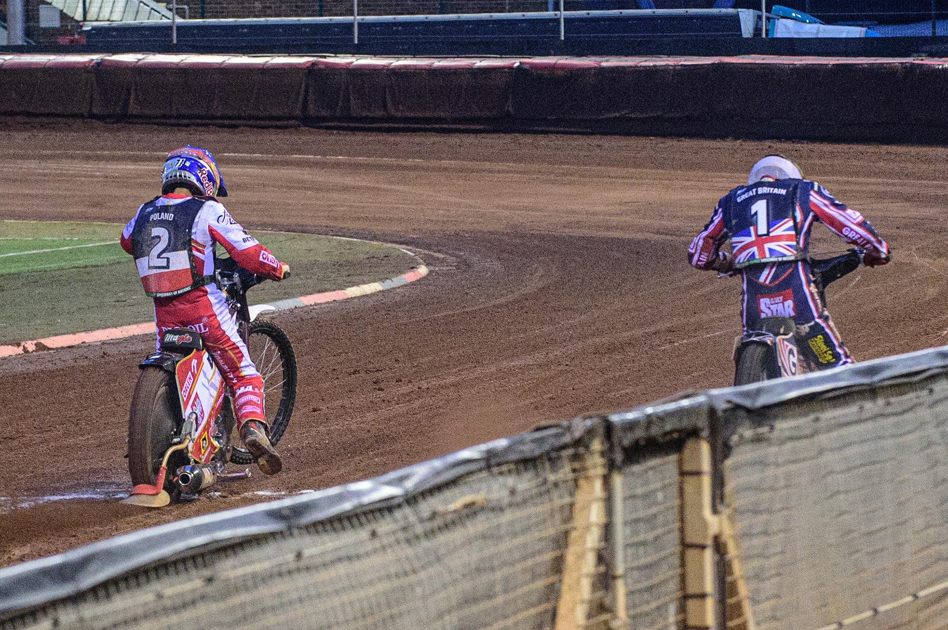 MANCHESTER, UK. OCT 17TH Maciej Janowski of Poland (Blue) and Dan Bewley of Great Britain (White) leave the start during the Monster Energy FIM Speedway of Nations at the National Speedway Stadium, Manchester on Sunday  17th October 2021. (Credit: Ian Charles | MI News)