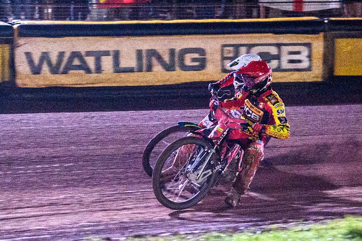Leicester Lions' Max Fricke in Red rides inside Belle Vue Aces' Jaimon Lidsey in White during the Rowe Motor Oil Premiership Grand Final 2nd Leg between Leicester Lions and Belle Vue Aces at the Pidcock Motorcycles Arena, Leicester on Thursday 26th September 2024. (Photo: Ian Charles | MI News)