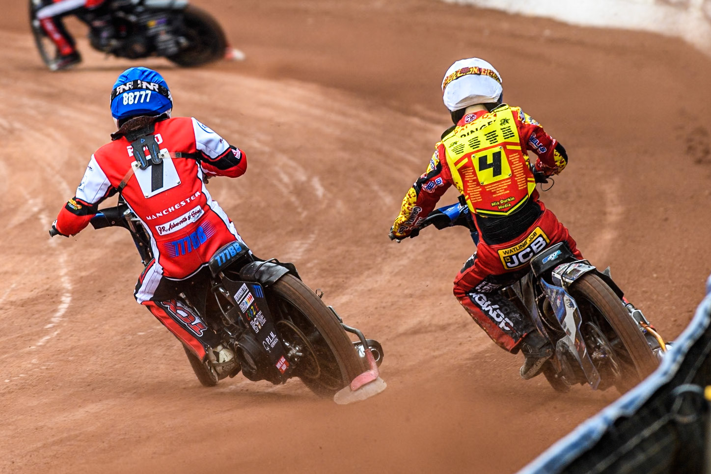 Belle Vue Colts' Billy Budd in Blue rides inside Leicester Lion Cubs' Sonny Springer in White during the WSRA National Development League match between Belle Vue Colts and Leicester Lion Cubs at the National Speedway Stadium, Manchester on Friday 18th April 2025. (Photo: Ian Charles | MI News)