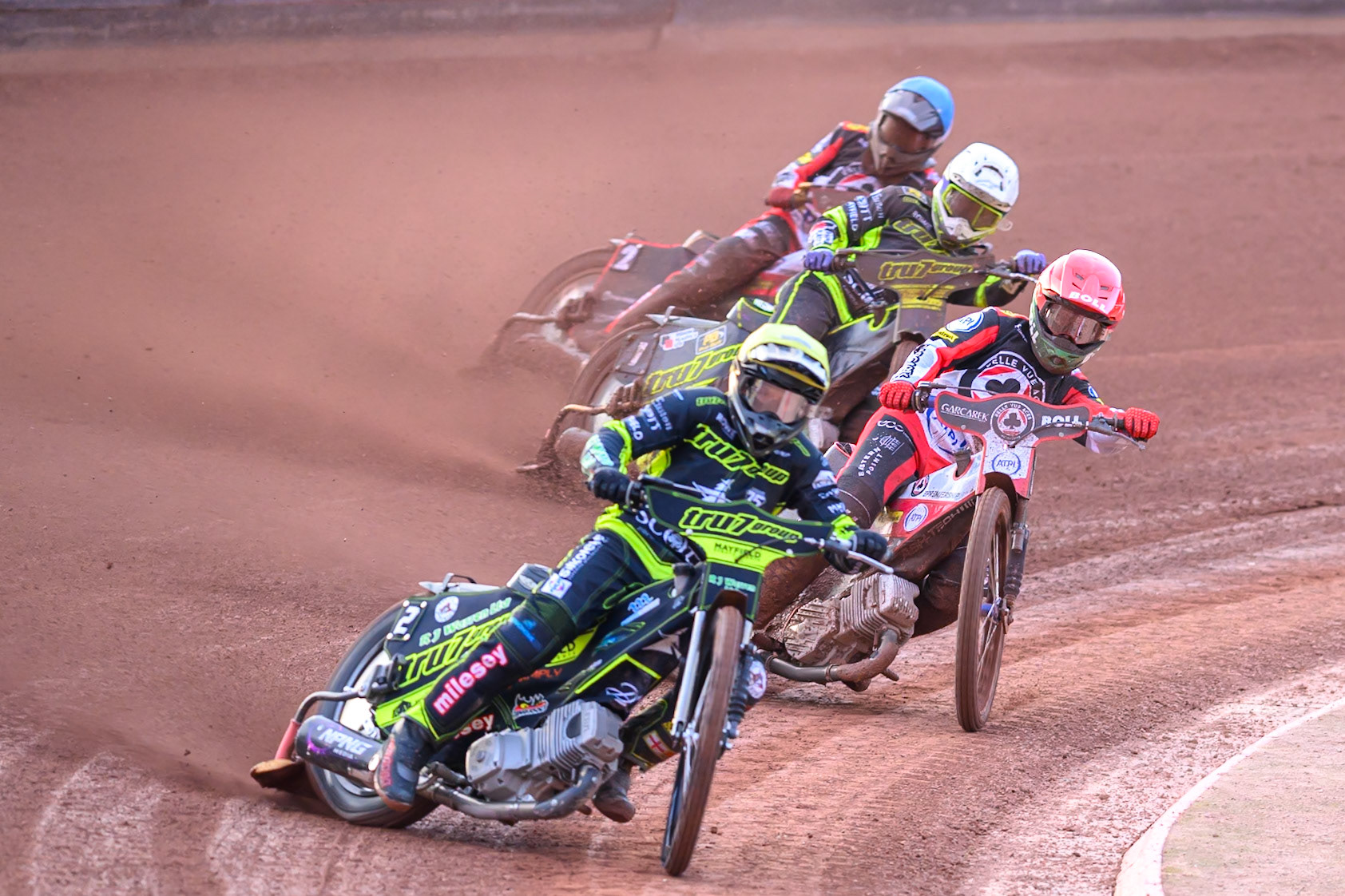 Danny King of Ipswich Witches  in Yellow leading Brady Kurtz of Belle Vue Aces  in Red, Tom Brennan of Ipswich Witches  in White and Norick Blödorn of Belle Vue Aces  in Blue during the Rowe Motor Oil Premiership match between Belle Vue Aces and Ipswich Witches at the National Speedway Stadium, Manchester on Monday 20th April 2026. (Photo: Ian Charles | MI News)