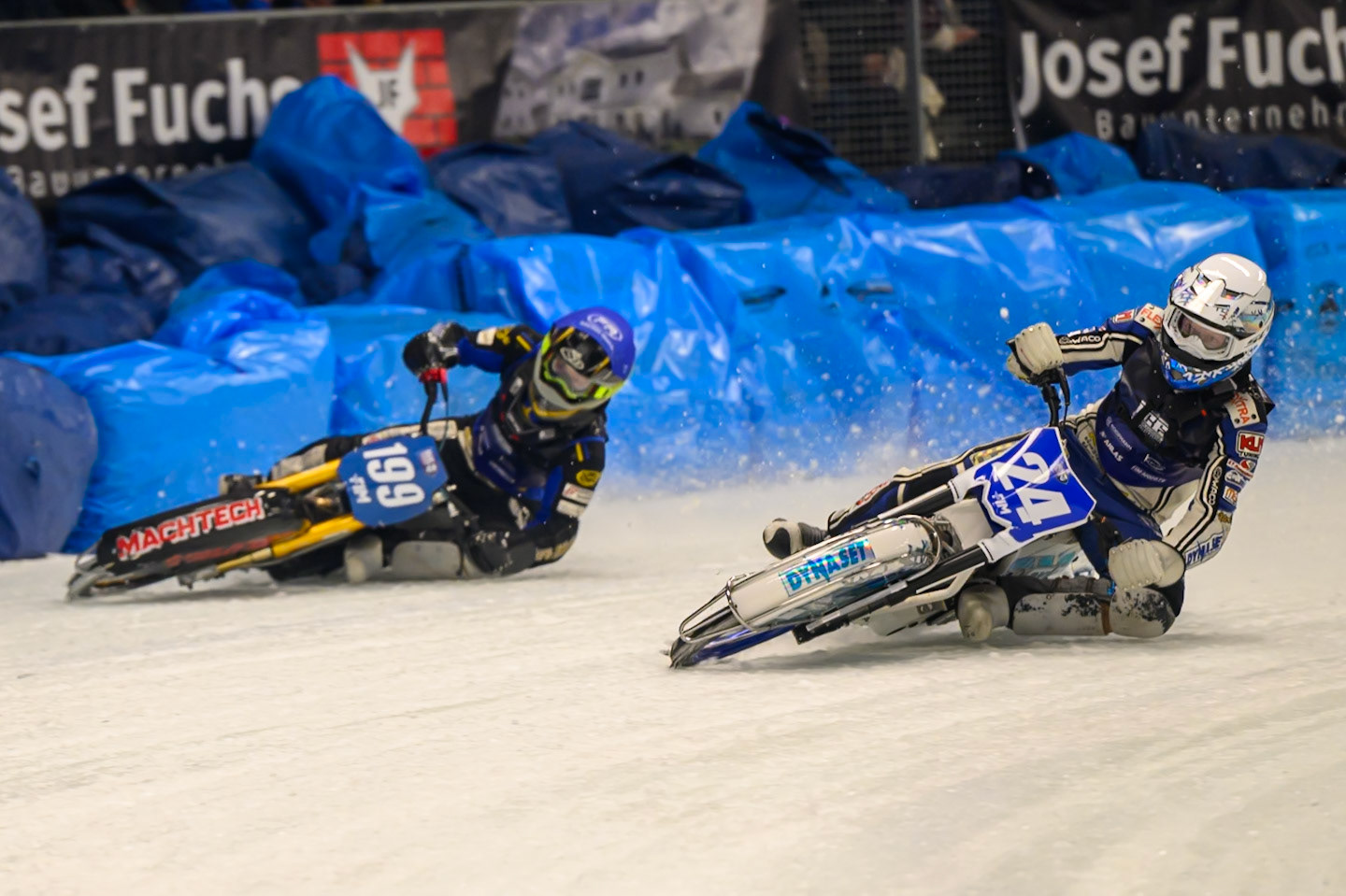 Max Koivula (24) of Finland  in White rides inside Martin Haarahiltunen (199) of Sweden  in Blue during the Ice Speedway Gladiators World Championship Final 1 at Max-Aicher-Arena, Inzell on Saturday 14th March 2026. (Photo: Ian Charles | MI News)