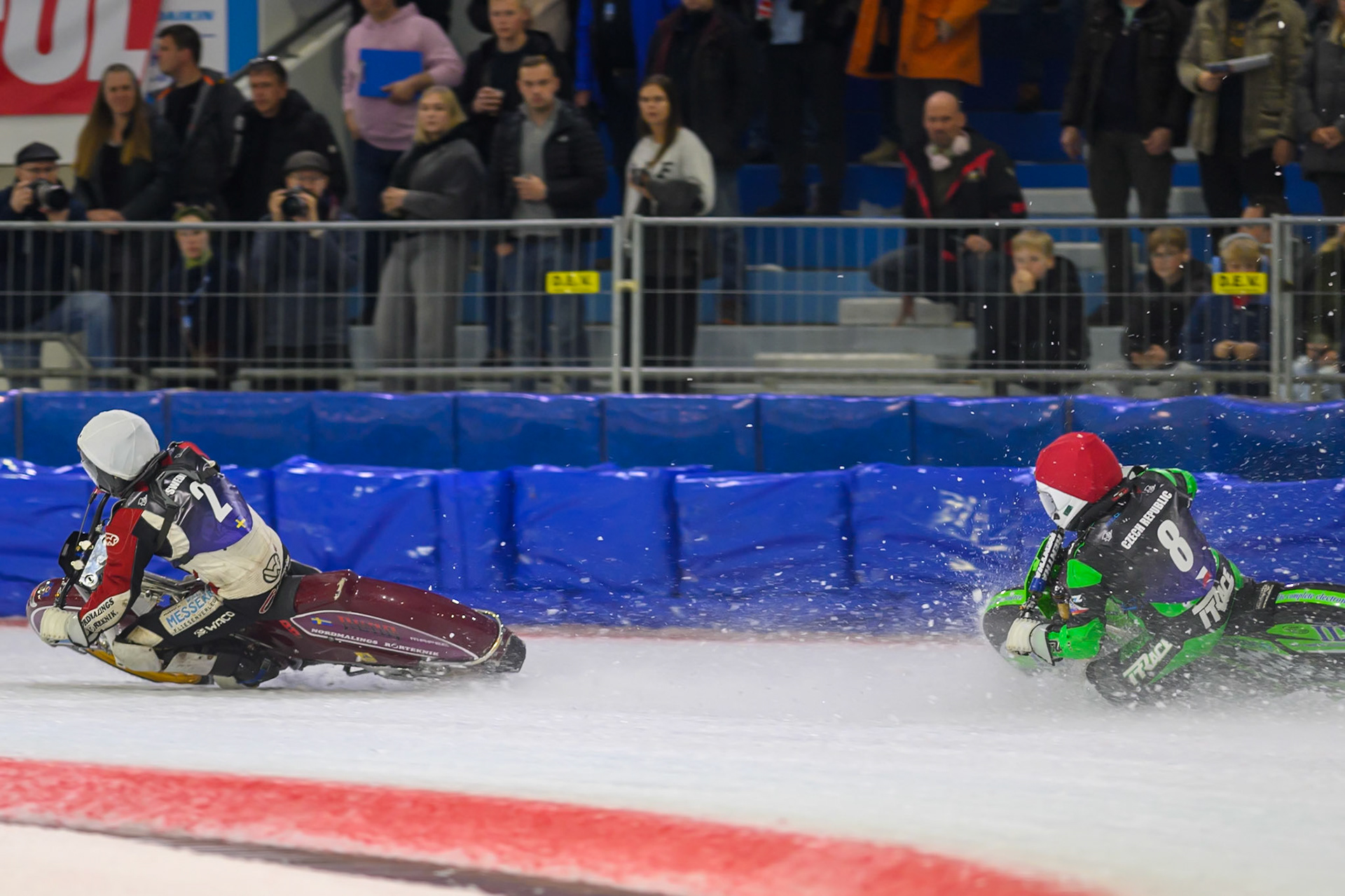 Ove Ledstrom (2) of Sweden  in White leading Andrej Diviš (8) of Czechia  in Red during the FIM Ice Speedway Of Nations at Ice Rink Thialf, Heerenveen on Sunday 12th April 2026. (Photo: Ian Charles | MI News)