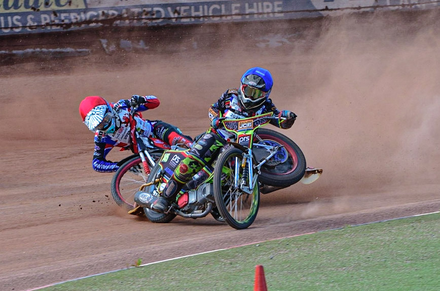 MANCHESTER, UK. JUN 3RD Charlie Wood (33) (Red) crashes behind William Cairns (145)  (Blue) during the British Youth Speedway Championship (Round 4)  at the National Speedway Stadium, Manchester on Friday 3rd June 2022. (Credit: Ian Charles | MI News)