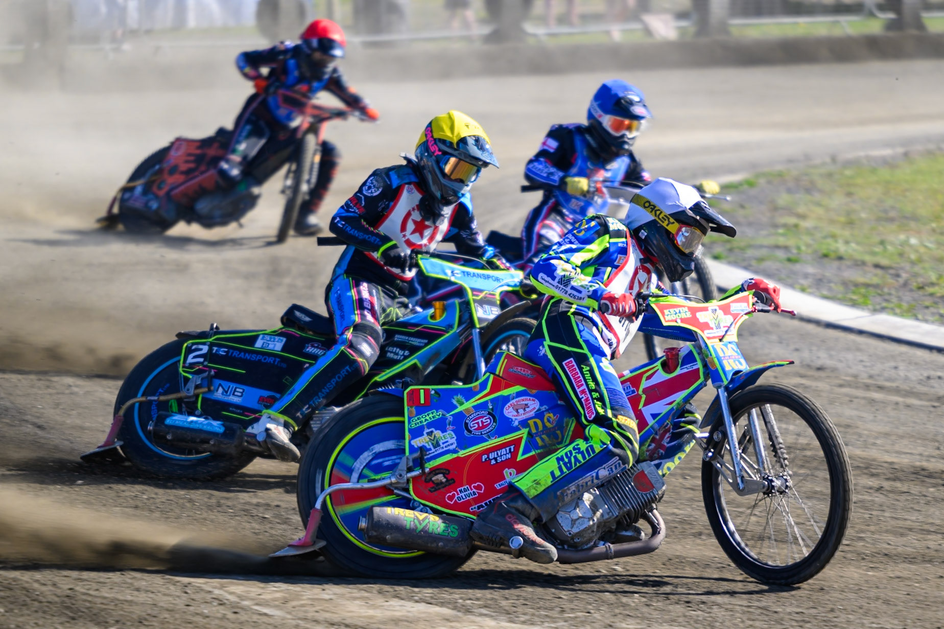 Simon Lambert of Stoke Potters in White leading Eli Meadows of Stoke Potters  in Yellow, Jack Shimelt of Buxton Bulls  in Blue and Bailey Fellows of Buxton Bulls  in Red during the National Development League Challenge match between Buxton Bulls and Stoke Potters at Hi-Edge Speedway, Buxton on Sunday 24th May 2026. (Photo: Ian Charles | MI News)