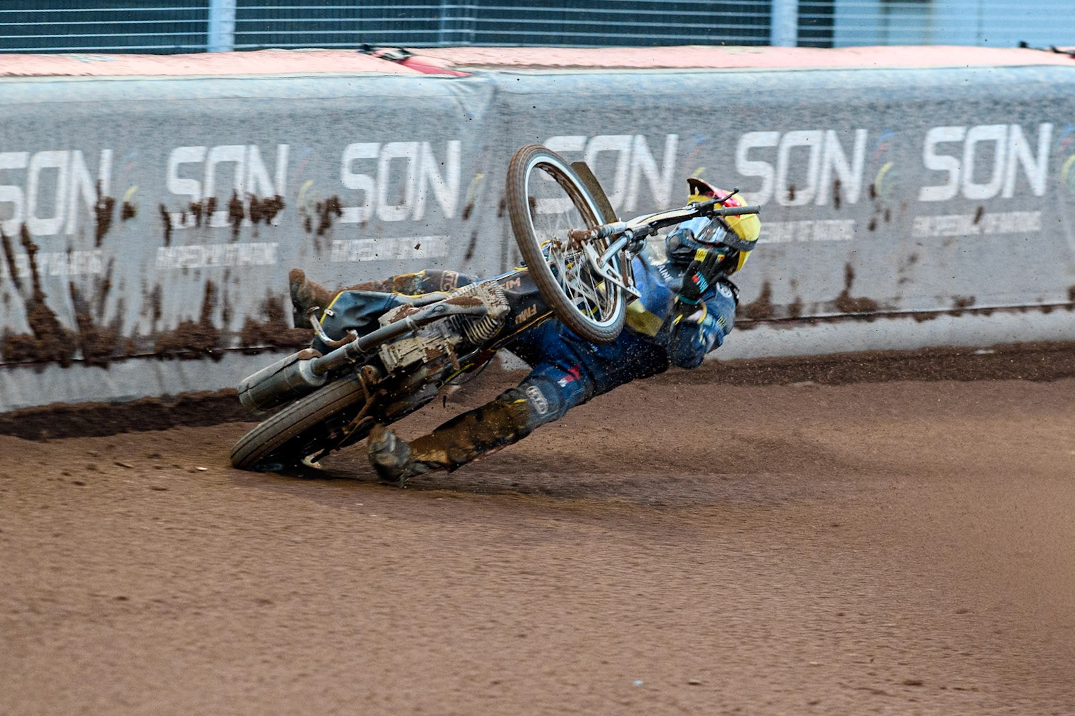 Marko Levishyn of Ukraine in Yellow crashes out of his final heat during the Monster Energy FIM Speedway of Nations Semi-Final 1 at the National Speedway Stadium, Manchester on Tuesday 9th July 2024. (Photo: Ian Charles | MI News)