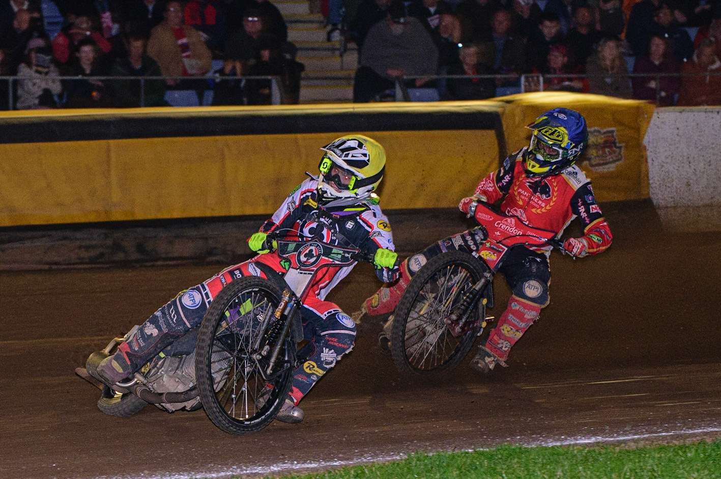 PETERBOROUGH, UK. OCT 14TH Tom Brennan  (Yellow) leads Chris Harris (Blue) during the SGB Premiership Grand Final 2nd leg between Peterborough and Belle Vue Aces at East of England Showground, Peterborough on Thursday 14th October 2021. (Credit: Ian Charles | MI News)