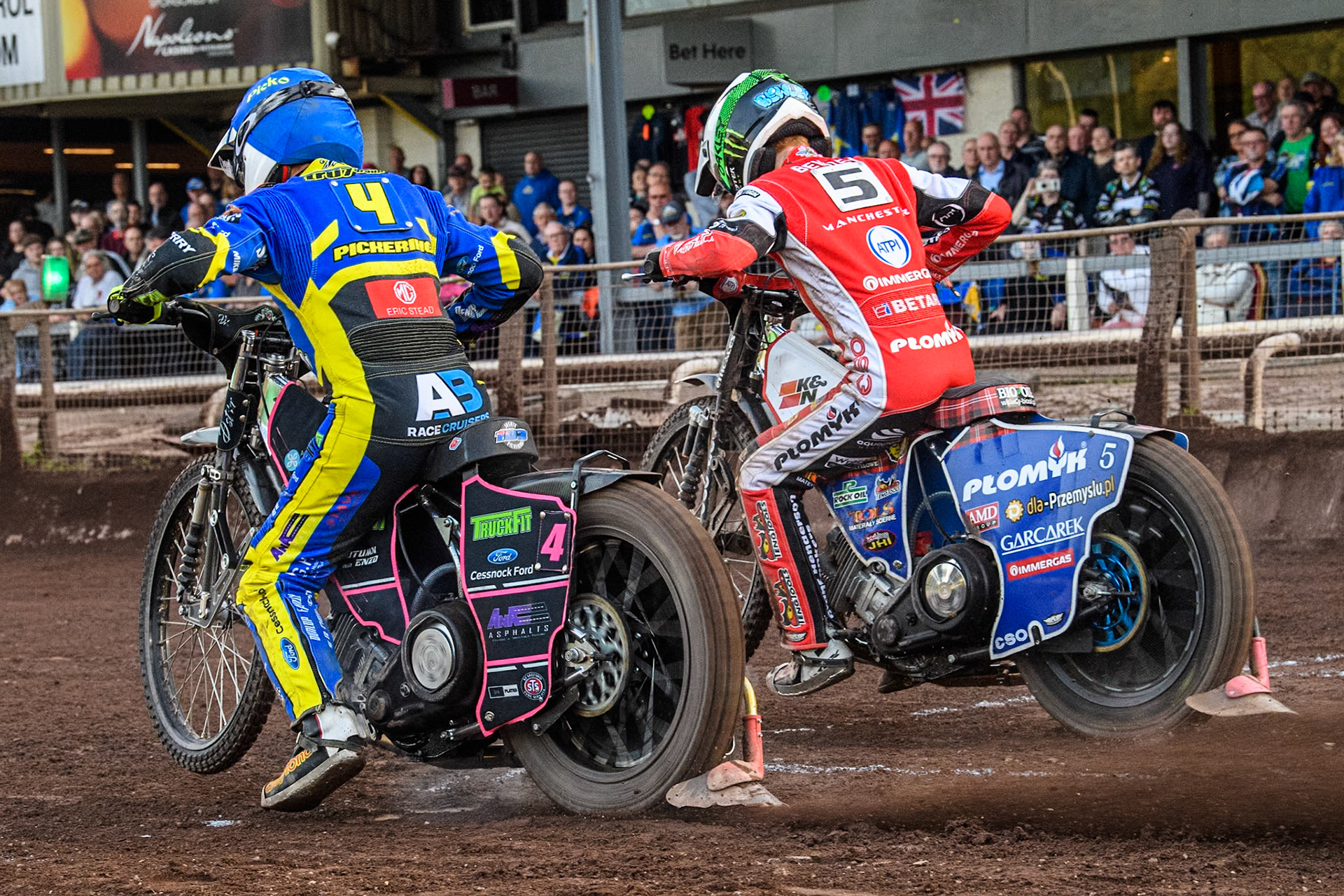 Sheffield Tigers' Josh Pickering  in Blue and Belle Vue Aces' Dan Bewley  in White leave the start line during the Premiership KO Cup Quarter Final, 2nd Leg match between Sheffield Tigers and Belle Vue Aces at Owlerton Stadium, Sheffield on Thursday 9th May 2024. (Photo: Ian Charles | MI News)