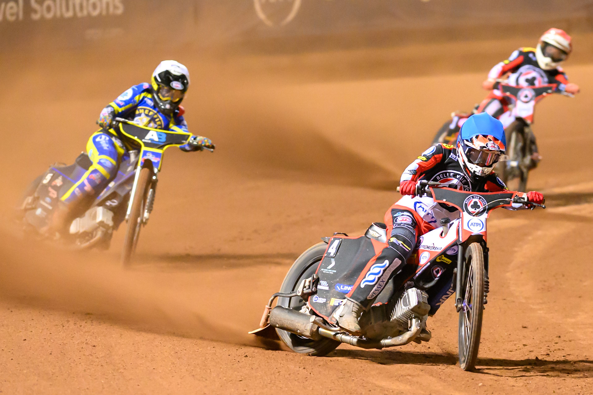Zach Cook of Belle Vue Aces in Blue leading Josh Pickering of Sheffield Tigers in White and Peter Kildemand of Belle Vue Aces in Red during the Rowe Motor Oil Premiership match between Belle Vue Aces and Sheffield Tigers at the National Speedway Stadium, Manchester on Monday 14th September 2026. (Photo: Ian Charles | MI News)