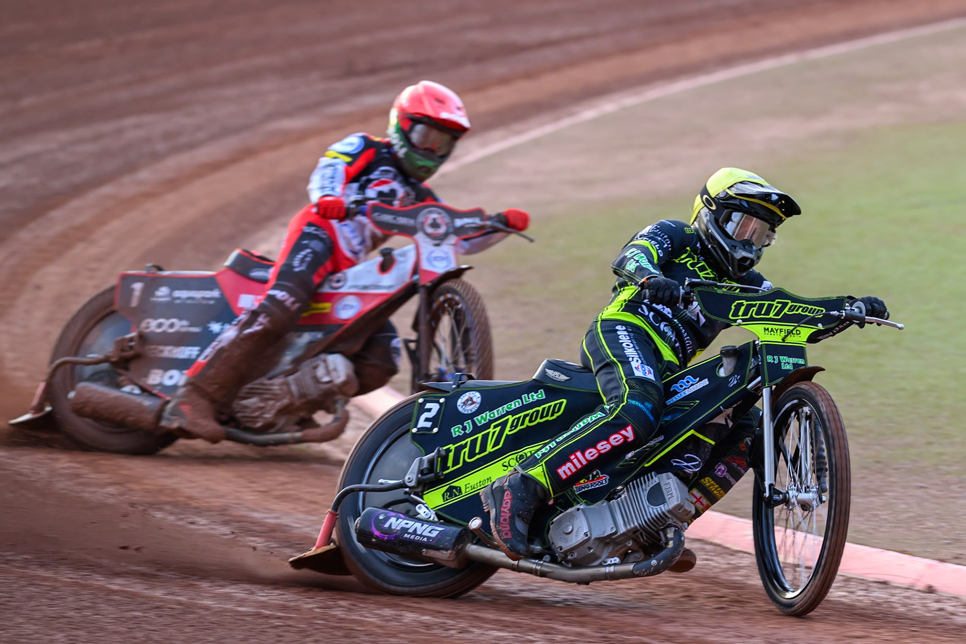 Danny King of Ipswich Witches  in Yellow leading Brady Kurtz of Belle Vue Aces  in Red during the Rowe Motor Oil Premiership match between Belle Vue Aces and Ipswich Witches at the National Speedway Stadium, Manchester on Monday 20th April 2026. (Photo: Ian Charles | MI News)