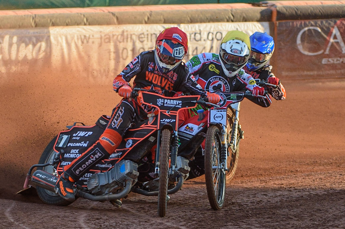 WOLVERHAMPTON, UK. JULY 26TH Sam Masters  (Red) leads Richie Worrall  (Yellow) and Broc Nicol  (Blue) during the SGB Premiership match between Wolverhampton Wolves and Belle Vue Aces at the Ladbroke Stadium, Wolverhampton on Monday 26th July 2021. (Credit: Ian Charles | MI News)