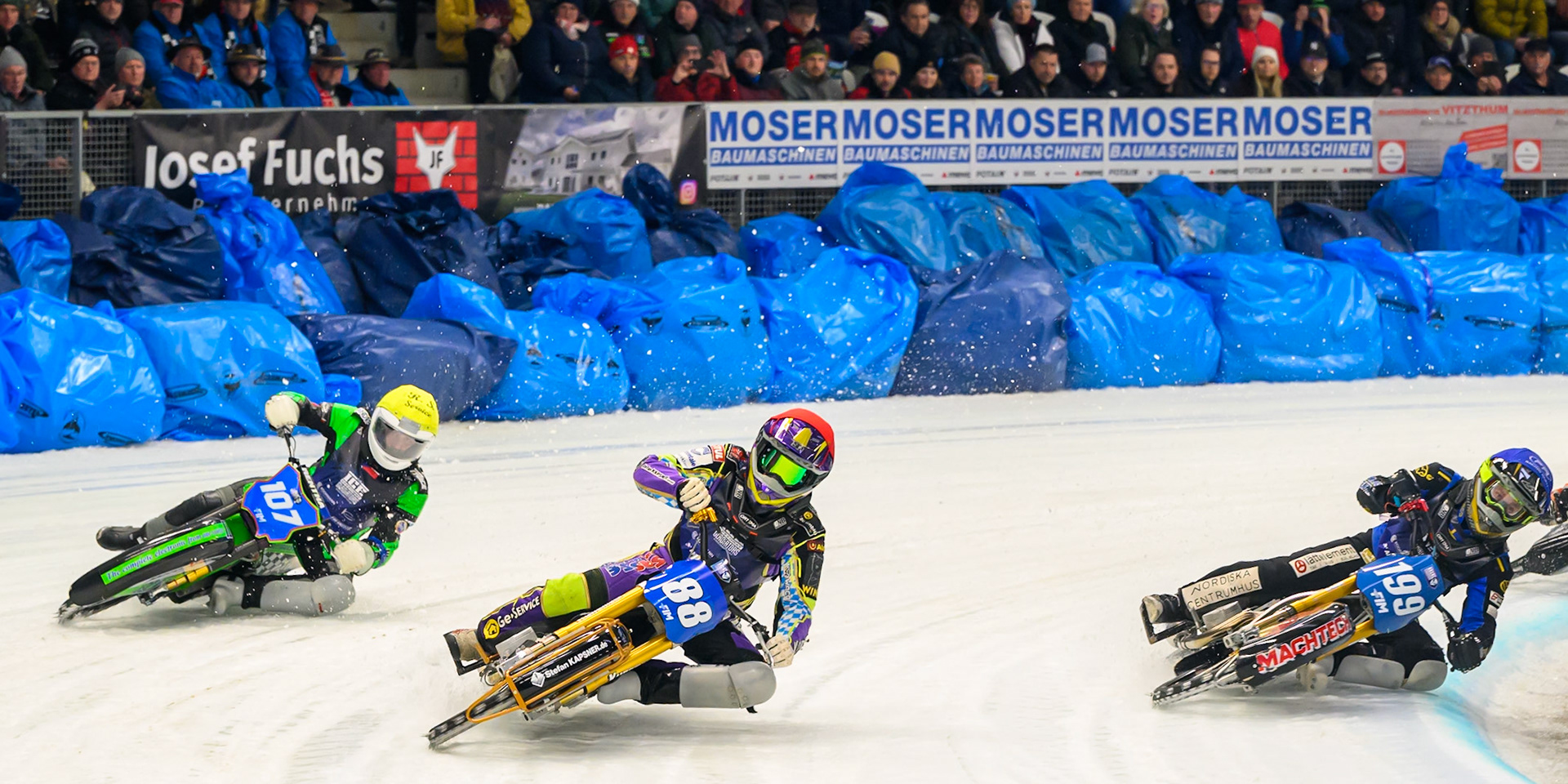 Max Niedermaier (88) of Germany  in Red leading Martin Haarahiltunen (199) of Sweden in Blue and Andrej Divis (107) of Czechia in Yellow during the Ice Speedway Gladiators World Championship Final 2 at Max-Aicher-Arena, Inzell on Sunday 15th March 2026. (Photo: Ian Charles | MI News)