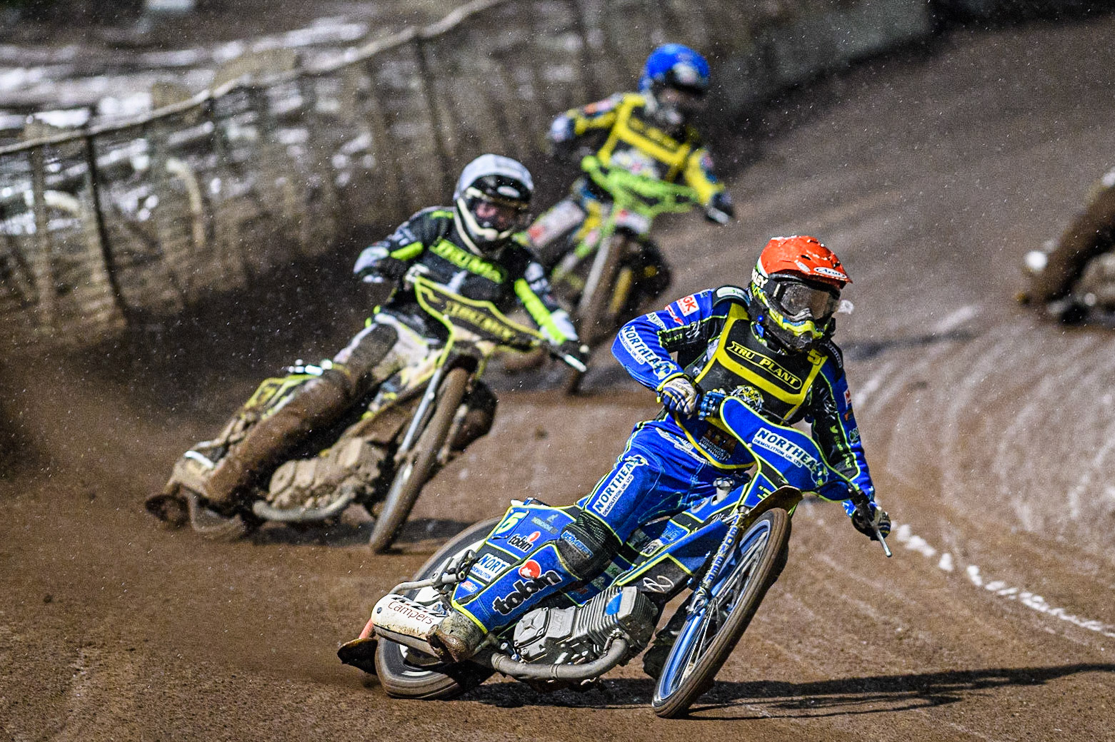 Chris Harris (Red) leads  Danny King (White) and Jye Etheridge (Blue) during the Sports Insure Premiership Grand Final Second Leg match between Sheffield Tigers and Ipswich Witches at Owlerton Stadium, Sheffield on Thursday 5th October 2023. (Photo: Ian Charles | MI News)