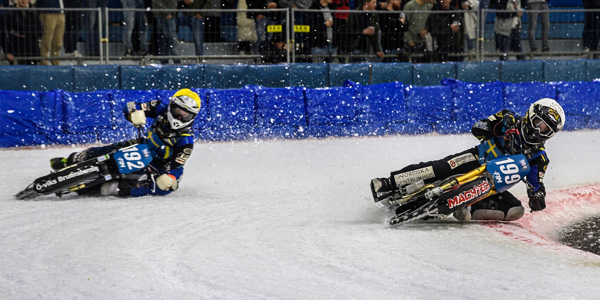 Martin Haarahiltunen (199) of Sweden in White rides inside Niclas Svensson (192) of Sweden in Yellow during the FIM Ice Speedway Gladiators World Championship, Final 3 at the Ice Stadium, Thialf, Heerenveen on Saturday 5th April 2025. (Photo: Ian Charles | MI News)