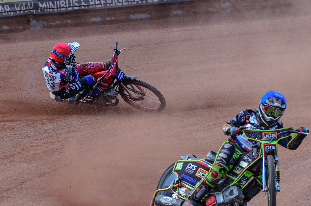 MANCHESTER, UK. JUN 3RD Charlie Wood (33) (Red) crashes behind William Cairns (145)  (Blue) during the British Youth Speedway Championship (Round 4)  at the National Speedway Stadium, Manchester on Friday 3rd June 2022. (Credit: Ian Charles | MI News)
