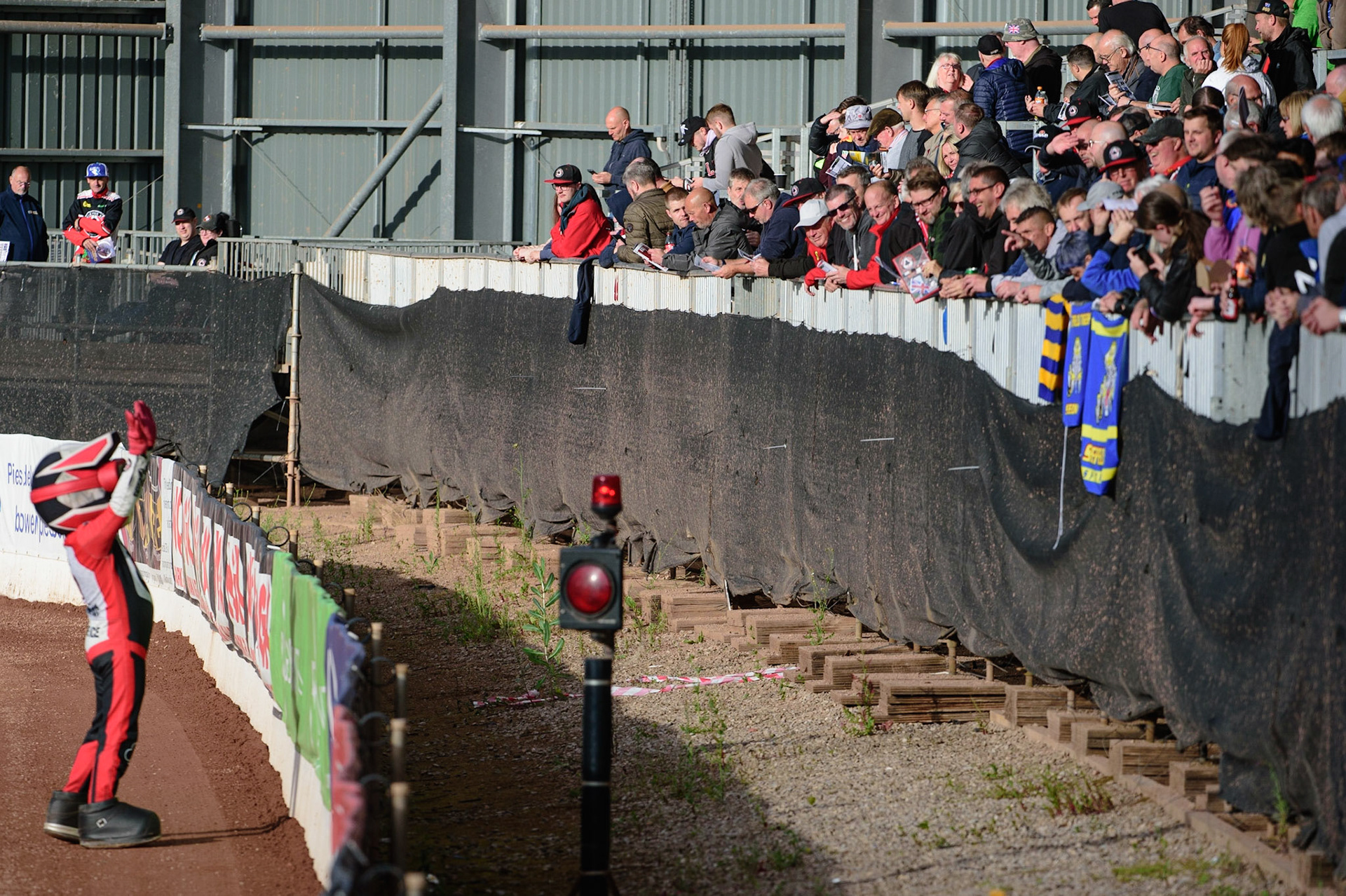 MANCHESTER, UK. JUL 5TH   Belle Vue ATPI Aces  mascot Chase The Aces warms up the crowd during the SGB Premiership match between Belle Vue Aces and Sheffield Tigers at the National Speedway Stadium, Manchester on Tuesday 5th July 2022. (Credit: Ian Charles | MI News)