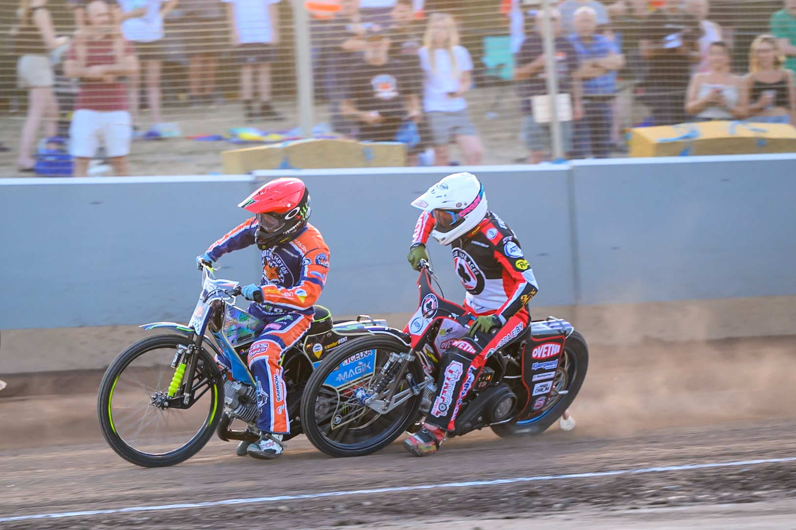 Peter Kildemand of Belle Vue Aces  in White and Jaimon Lidsey of Northampton Foxes  in Red  almost collide during the Rowe Motor Oil Premiership match between Northampton Foxes and Belle Vue Aces at Northampton International Shaleway, Northampton on Thursday 13th August 2026. (Photo: Ian Charles | MI News)