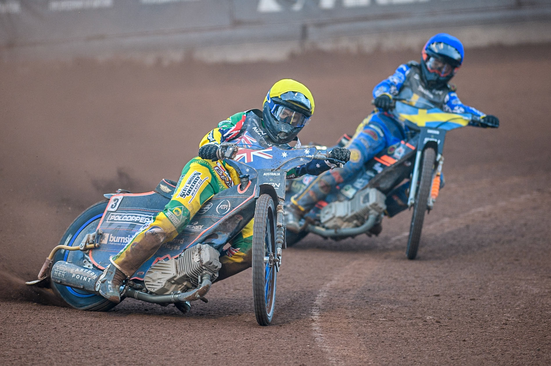 Brady Kurtz of Australia in Yellow leading Jacob Thorssell of Sweden in Blue during the Monster Energy FIM Speedway of Nation Final at the National Speedway Stadium, Manchester on Saturday 13th July 2024. (Photo: Ian Charles | MI News)