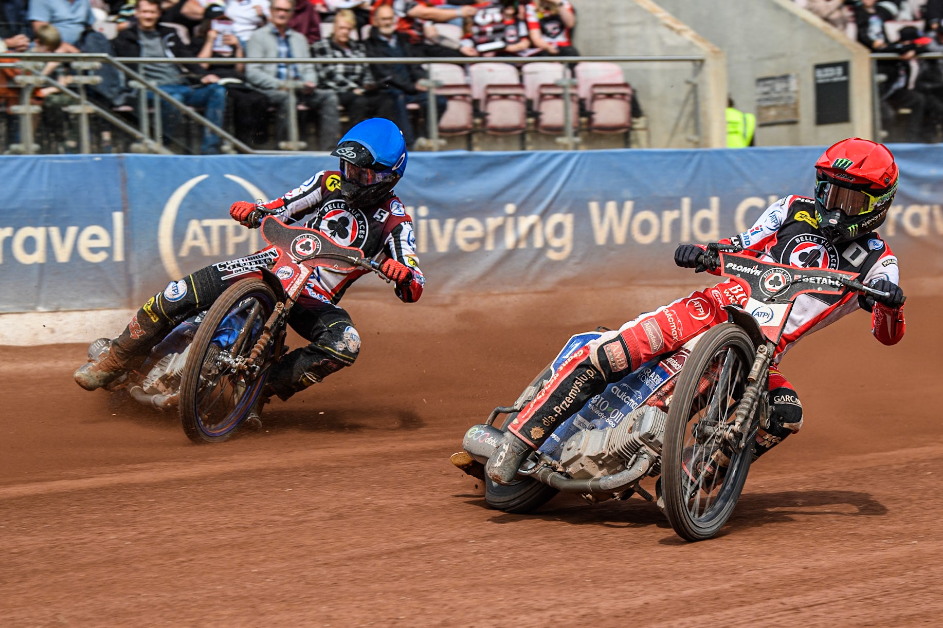 Belle Vue Aces' Dan Bewley   in Red rides inside team mate Brady Kurtz in Blue during the Rowe Motor Oil Premiership match between Belle Vue Aces and Sheffield Tigers at the National Speedway Stadium, Manchester on Monday 26th August 2024. (Photo: Ian Charles | MI News)