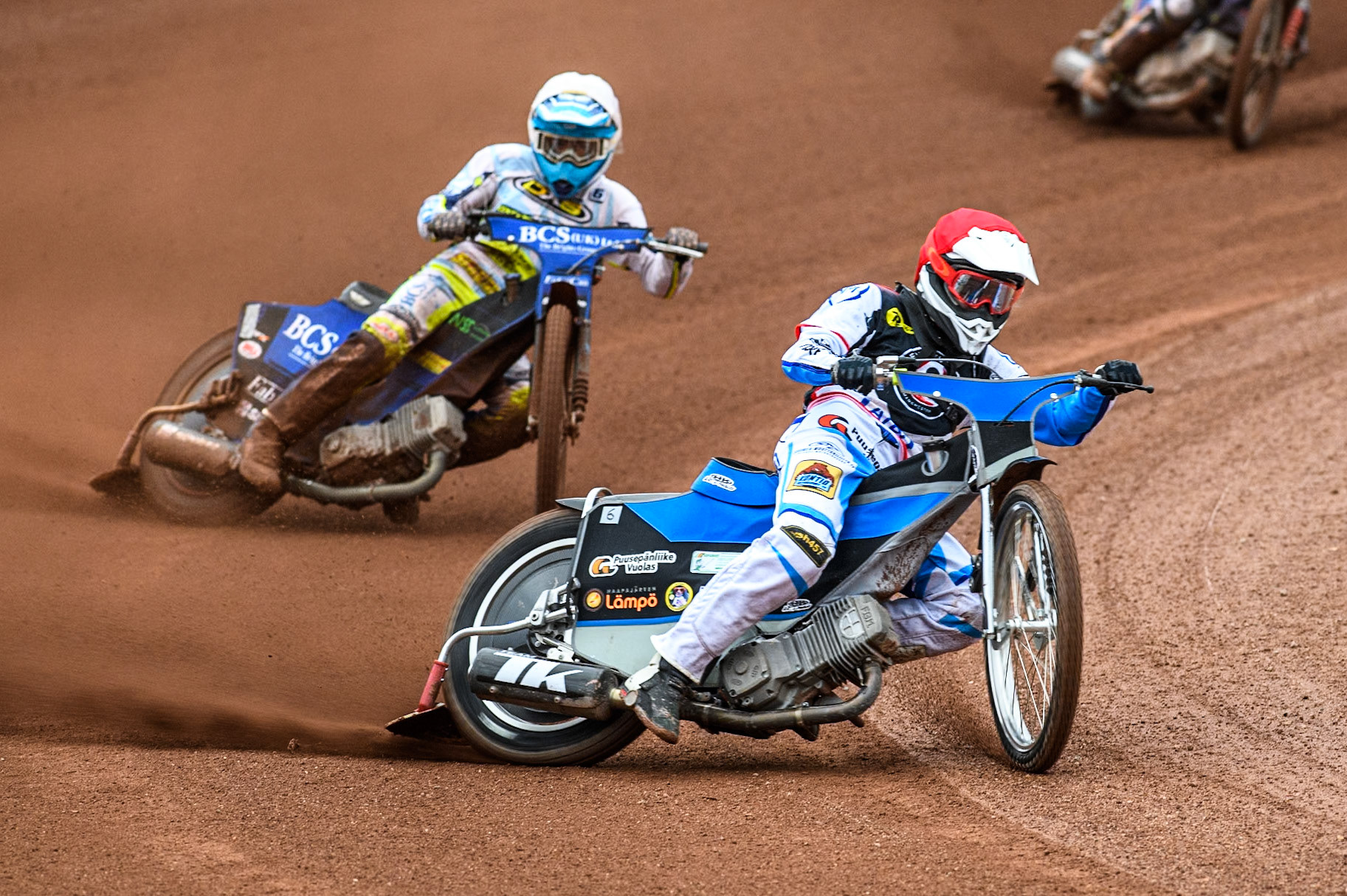 Belle Vue Aces' guest Antti Vuolas  in Red leading Oxford Spires' Ashton Boughen  in White during the Rowe Motor Oil Premiership match between Belle Vue Aces and Oxford Spires at the National Speedway Stadium, Manchester on Monday 22nd July 2024. (Photo: Ian Charles | MI News)