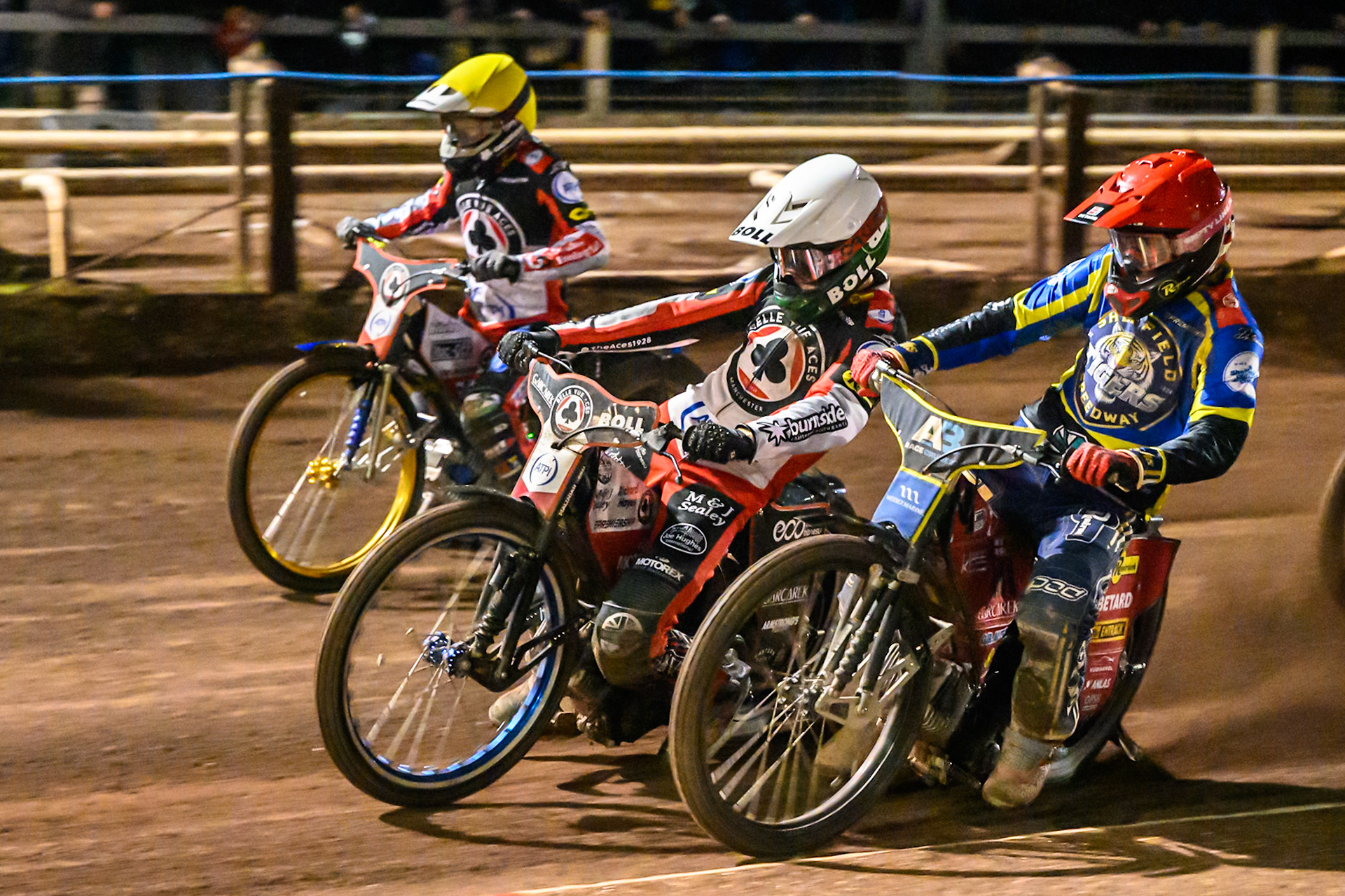 Brady Kurtz of Belle Vue Aces in White rides outside Max Fricke, Guest Rider for Sheffield Tigers in Red  with Jason Doyle of Belle Vue Aces in Yellow  on the outside during the Rowe Motor Oil Premiership Grand Final 1st Leg match between Sheffield Tigers and Belle Vue Aces at Owlerton Stadium, Sheffield on Monday 12th October 2026. (Photo: Ian Charles | MI News)