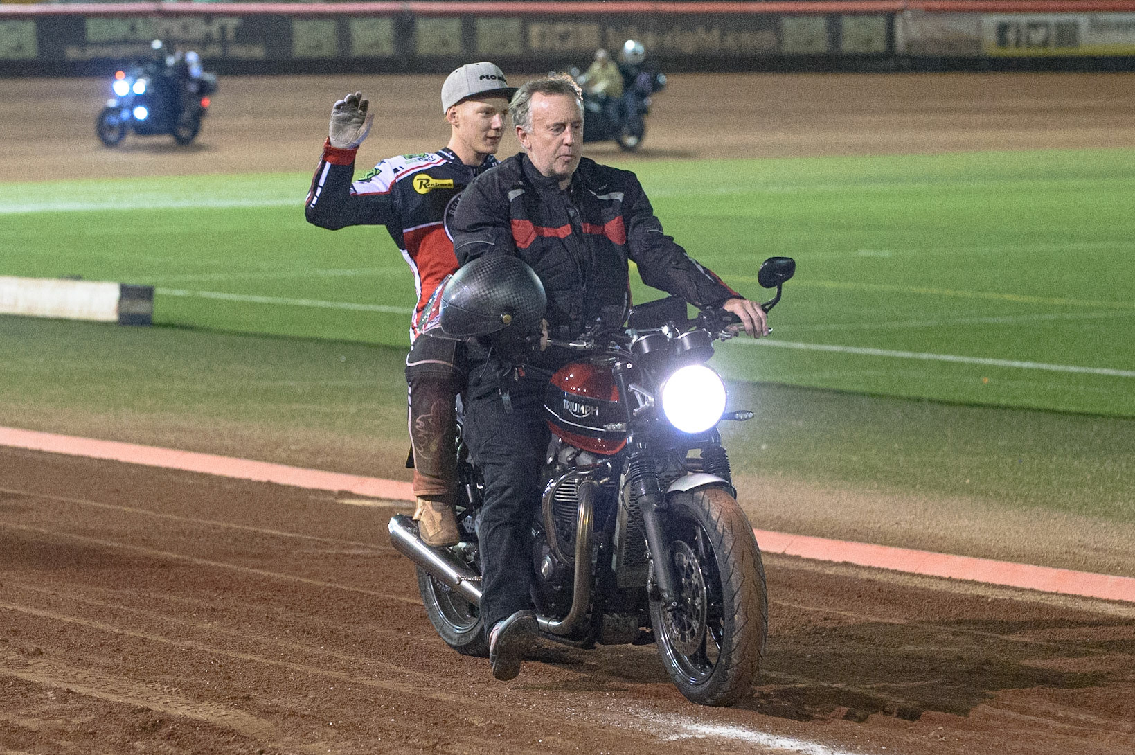 MANCHESTER, UK. SEPT 6TH  The riders on the back of Triumph motorcycles belonging to the Triumph owners club who attended the meeting during the SGB Premiership match between Belle Vue Aces and Sheffield Tigers at the National Speedway Stadium, Manchester on Monday 6th September 2021. (Credit: Ian Charles | MI News)