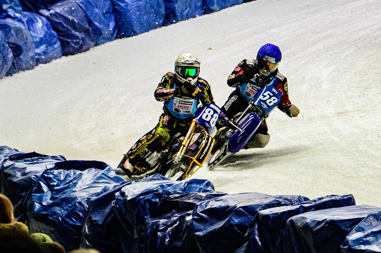 Stefan Svensson (Blue) chases Max Niedermaier (White) during the Race of Legends at the Max-Aicher-Arena, Inzell on Friday 17th March 2023. (Photo: Ian Charles | MI News)