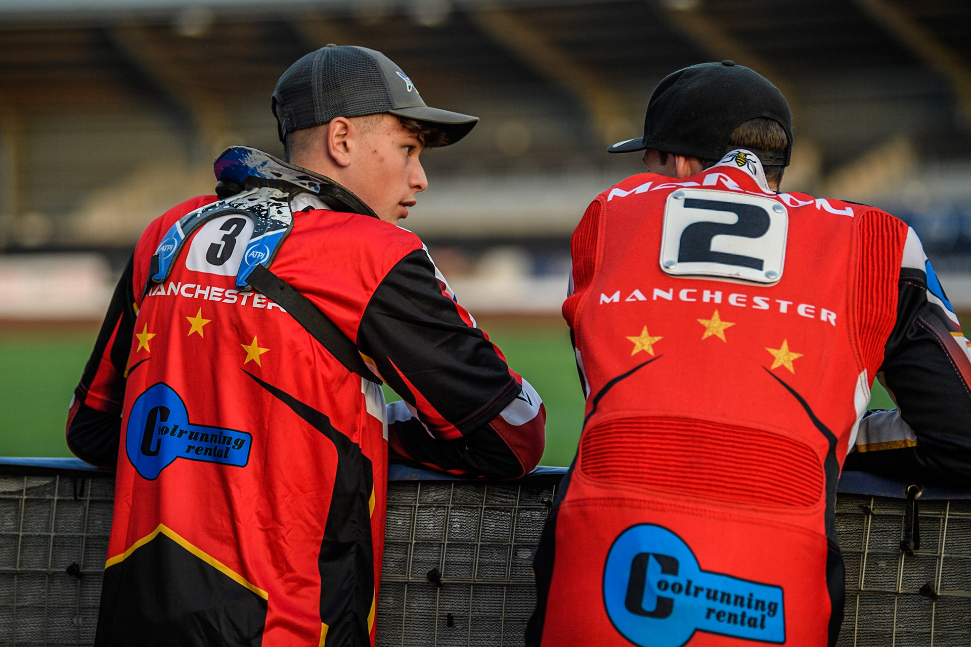 Sam McGurk (Left) and Matt Marson watch the extended track prep during the National Development League match between Belle Vue Colts and Leicester Lion Cubs at the National Speedway Stadium, Manchester on Friday 8th September 2023. (Photo: Ian Charles | MI News)