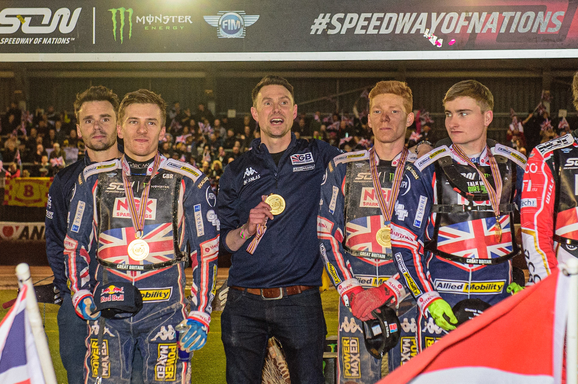 MANCHESTER, UK. OCT 17TH Great Britain - Speedway of Nations champions (l-r) Ollie Allen (Manager), Robert Lambert, Simon Stead (Manager) Dan Bewley and Tom Brennan during the Monster Energy FIM Speedway of Nations at the National Speedway Stadium, Manchester on Sunday  17th October 2021. (Credit: Ian Charles | MI News)