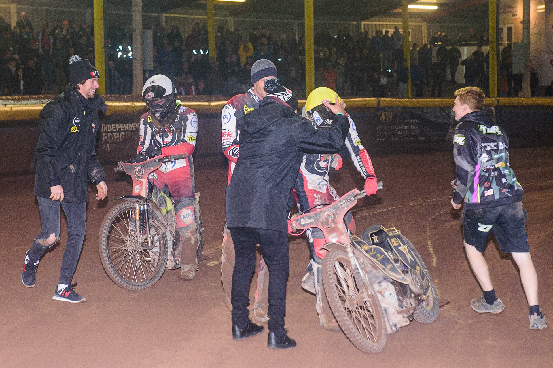 Norick Blödorn  (Yellow) and Tom Brennan   (White) are congratulated by their team mates on their Championship winning rides during the SGB Premiership Grand Final 2nd Leg between Sheffield Tigers and Belle Vue Aces at Owlerton Stadium, Sheffield on Thursday 13th October 2022. (Credit: Ian Charles | MI News)