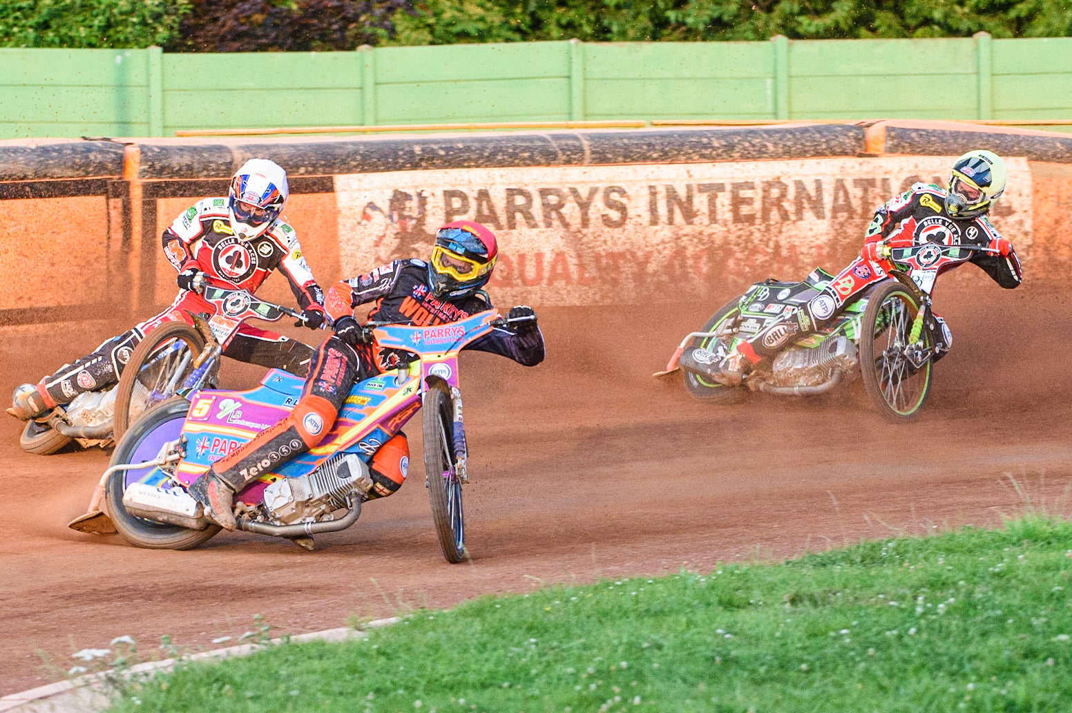 WOLVERHAMPTON, UK. JULY 26TH  Rory Schlein  (Red) leads Steve Worrall  (White) and Charles Wright  (Yellow) during the SGB Premiership match between Wolverhampton Wolves and Belle Vue Aces at the Ladbroke Stadium, Wolverhampton on Monday 26th July 2021. (Credit: Ian Charles | MI News)