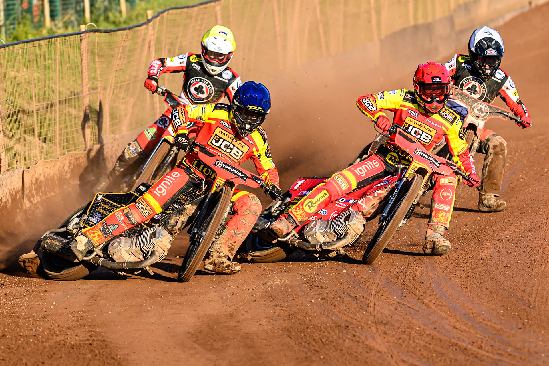 Leicester Lions' Kyle Howarth in Blue leading Leicester Lions' Max Fricke in Red, Zach Cook in White and Belle Vue Aces' Tate Zischke in Yellow  during the Rowe Motor Oil Premiership match between Leicester Lions and Belle Vue Aces at the Hydroscand Arena, Leicester on Thursday 19th June 2025. (Photo: Ian Charles | MI News)