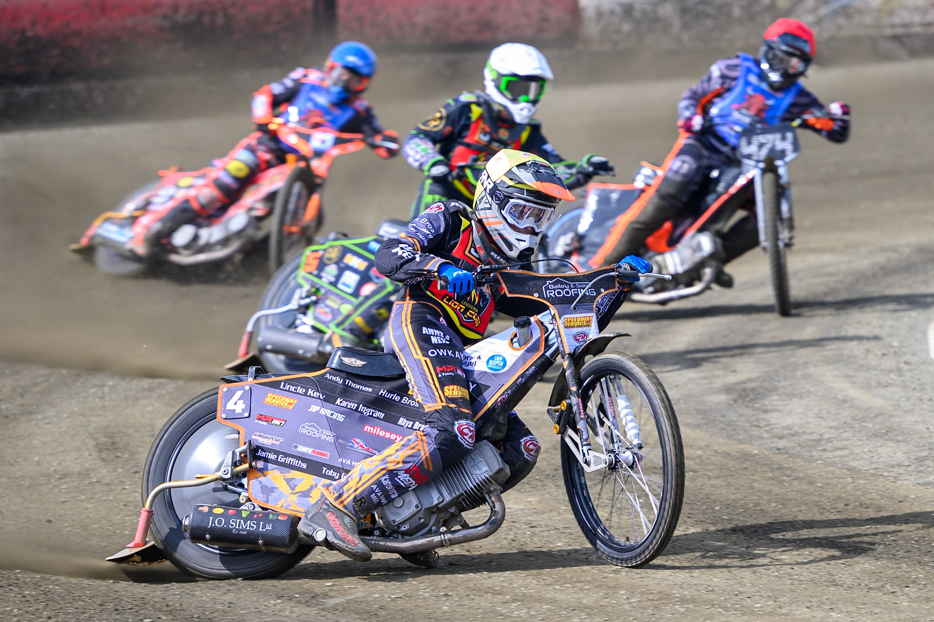 Ryan Ingram of Leicester Lion Cubs  in Yellow leading Max Perry of Leicester Lion Cubs  in White, Jack Roberts of Buxton Bulls  in Red and Alex Spooner of Buxton Bulls  in Blue  during the Challenge match between Buxton Bulls and Leicester Lion Cubs at Hi-Edge Speedway, Buxton on Sunday 26th April 2026. (Photo: Ian Charles | MI News)